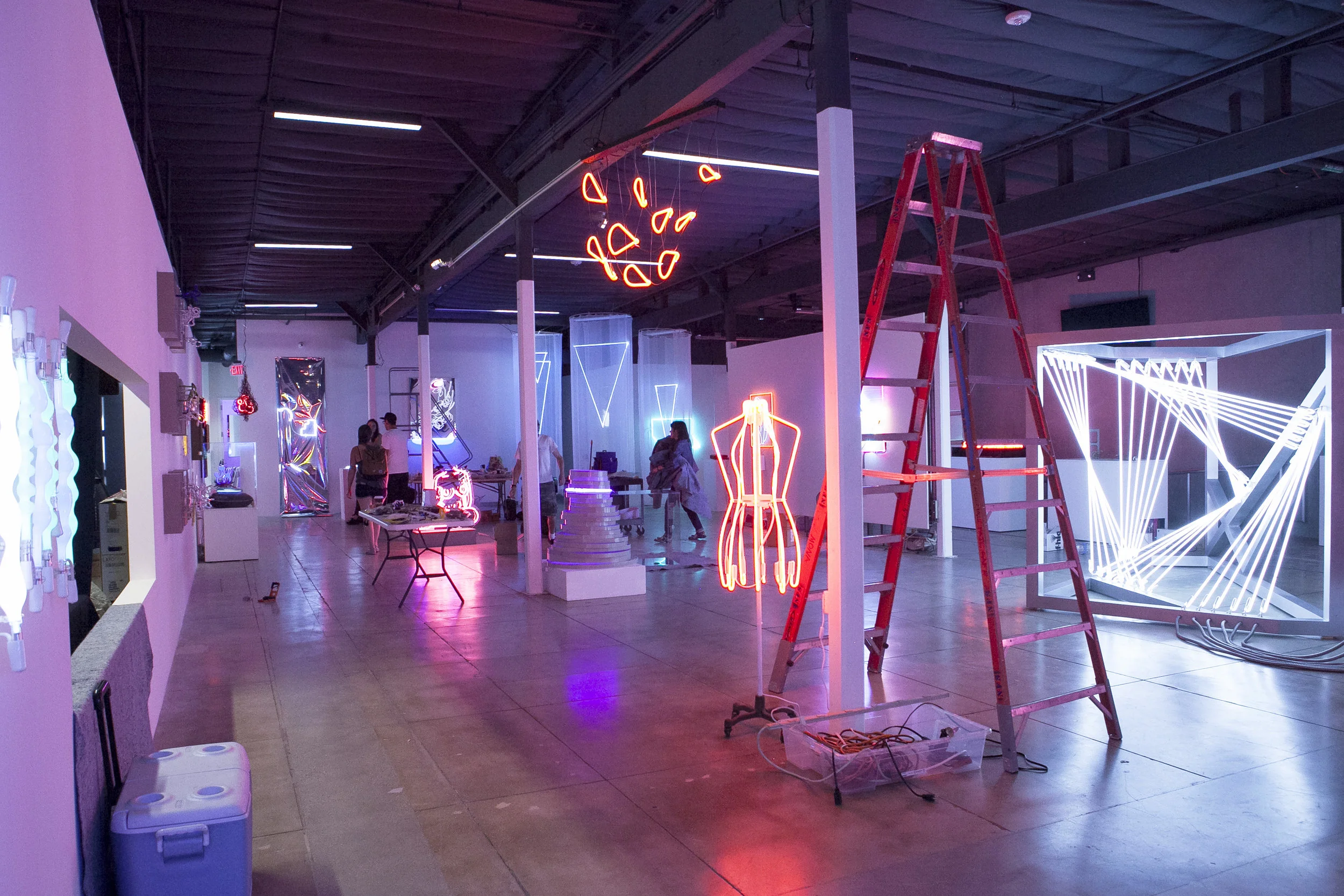 Shawna Peterson dress form, Lisa Shulte standing sculpture, Kacie Lees hanging sculpture