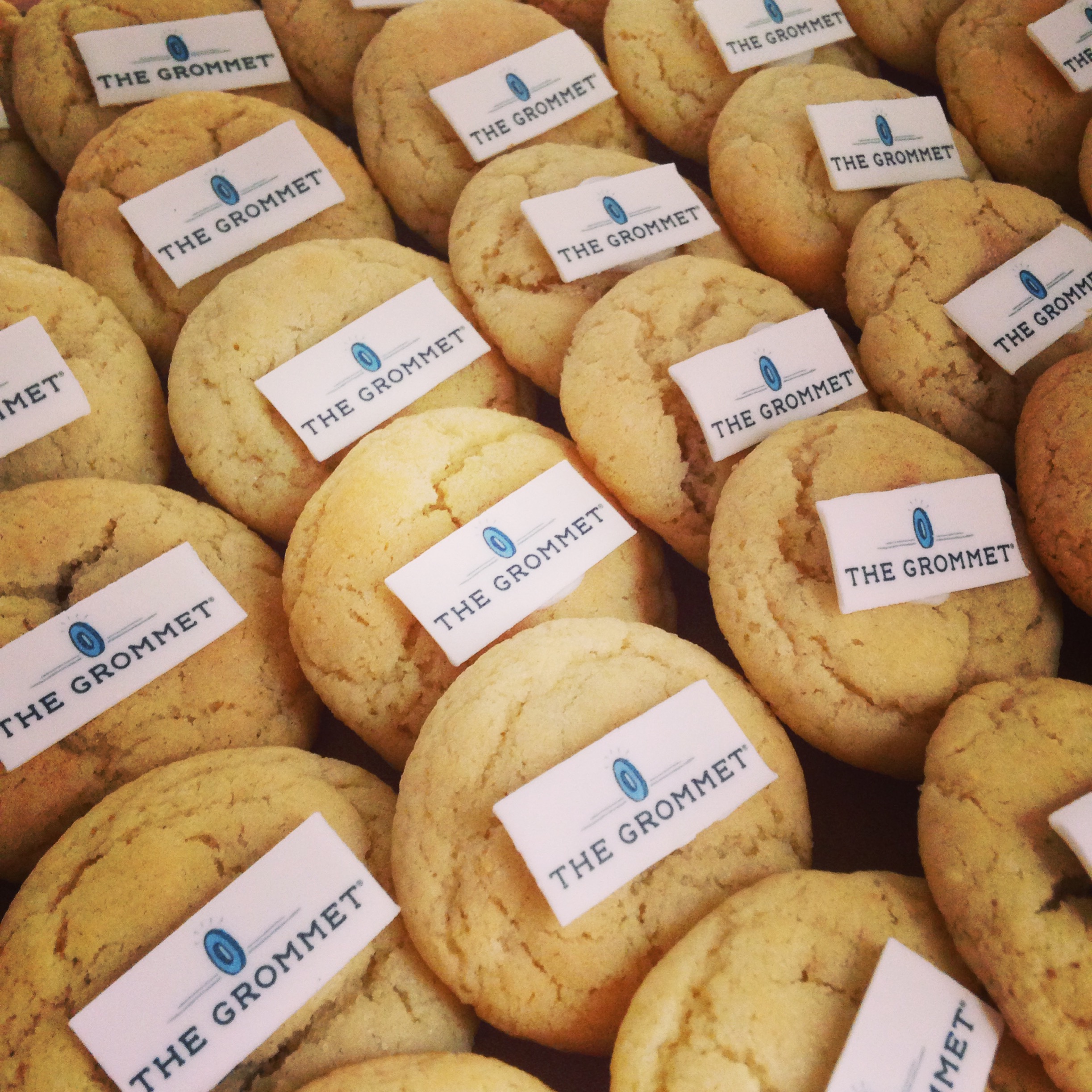 Custom cookies -- we'll print your logo, message, or photo on fondant and affix to any of our signature flavors!
