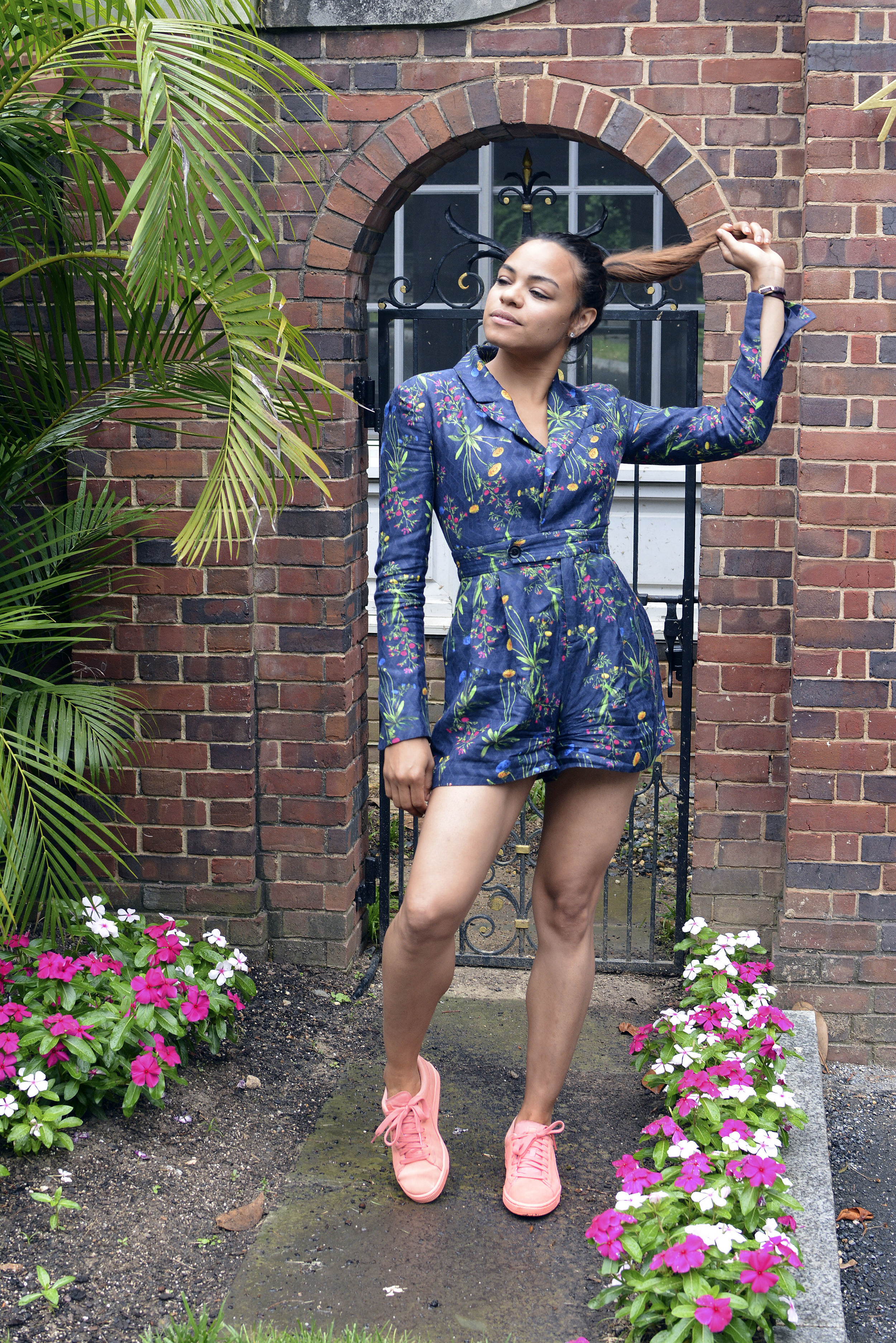wearing: Marissa Webb romper, Puma sneakers.