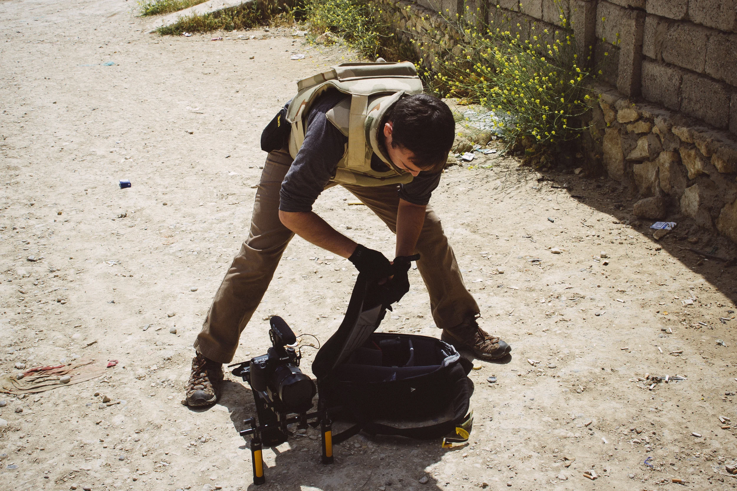 Dylan getting ready to enter the armored vehicle. Photo by Christian Stephen