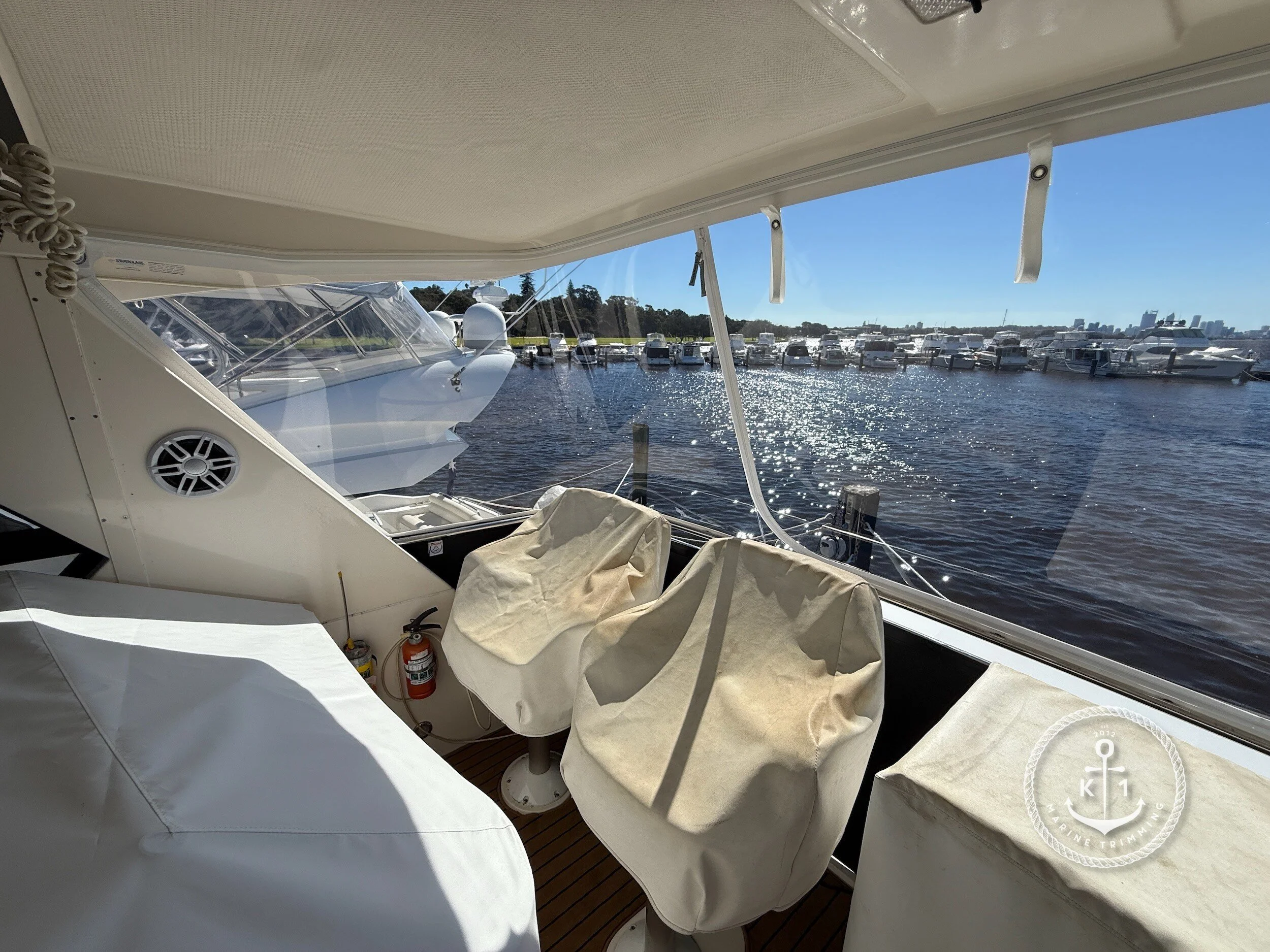 Make: Riviera Model: 52 Enclosed Flybridge Products: Flybridge Rear Clears, Rail Skirts, Rear Canopy Material: Strataglass Flybridge rear clears provide all-weather protection and enhanced visibility for your flybridge, ensuring comfort, safet