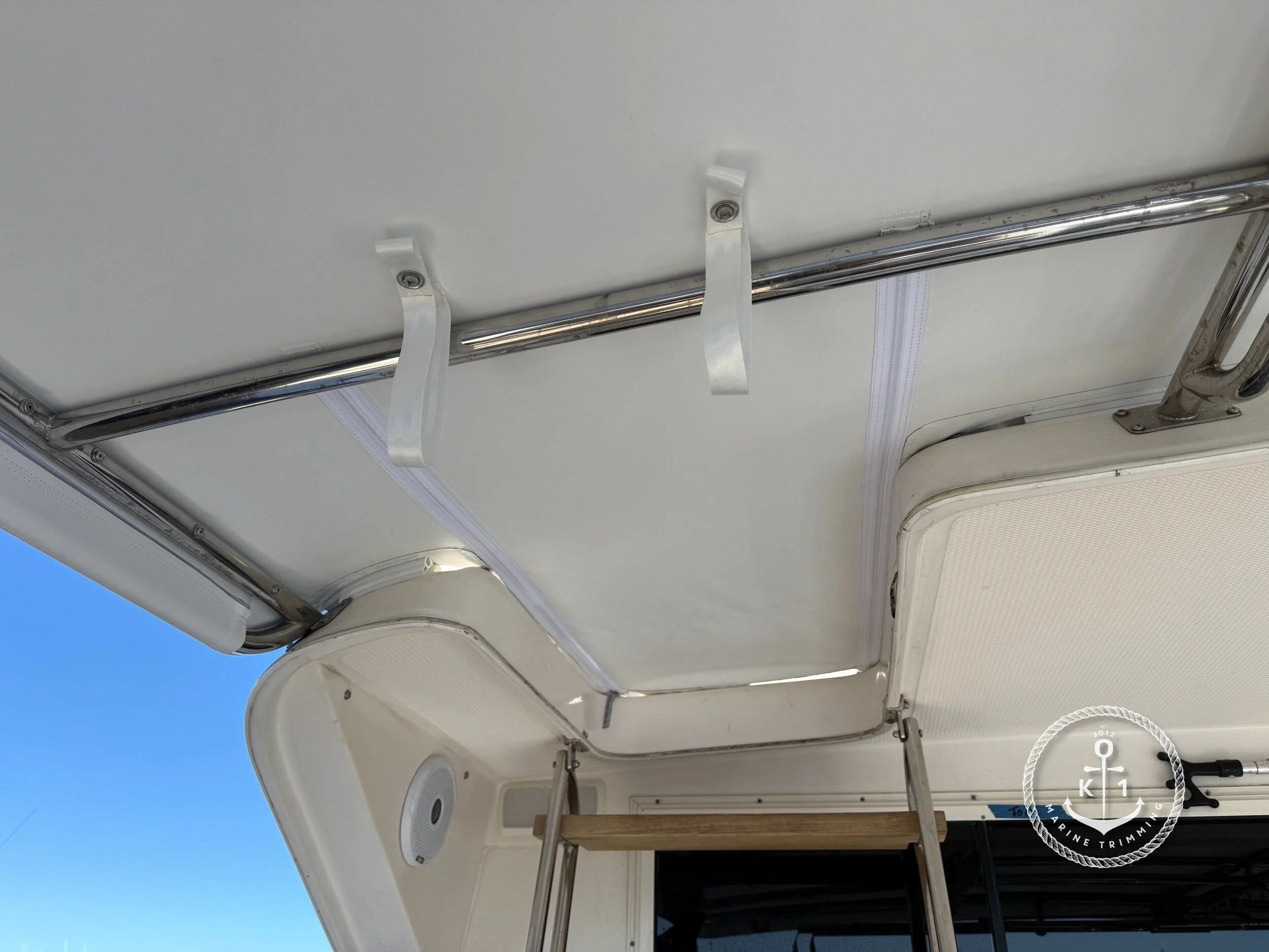 Make: Riviera Model: 52 Enclosed Flybridge Products: Rear Canopy Material: Stamoid Light (White) Rear Canopies offer shade and weather protection for the aft deck, creating a comfortable and sheltered outdoor space for relaxing or entertaining
