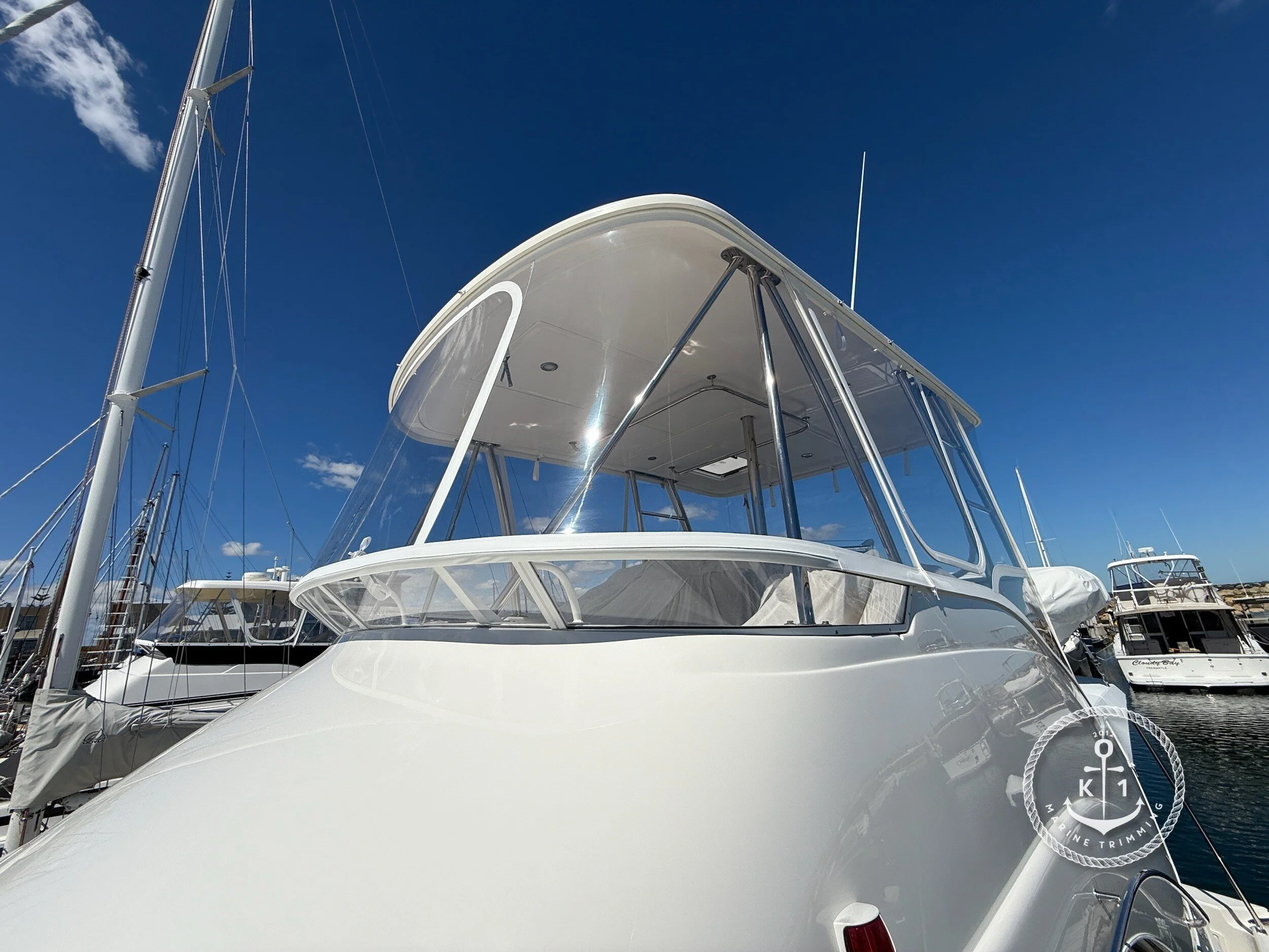 Make: Riviera Model: 41 Flybridge Products: Flybridge Clears, Rear Canopy, Tender Cover Material: Strataglass Flybridge clears provide all-weather protection and enhanced visibility for your flybridge, ensuring comfort, safety, and style on th