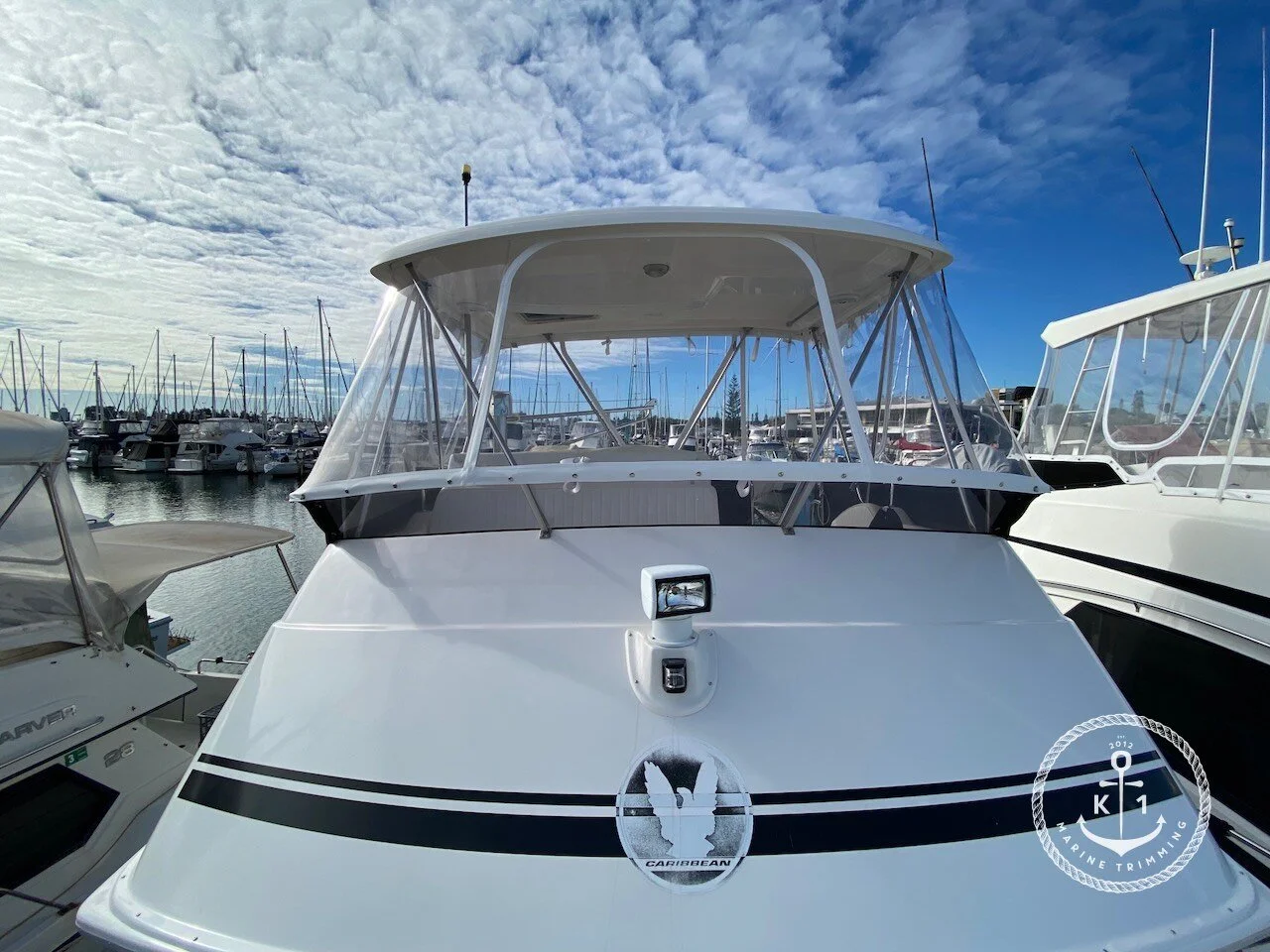  Make: Caribbean  Model: 35 Flybridge  Products: Flybridge Clears  Material: Strataglass  Flybridge clears provide all-weather protection and enhanced visibility for your flybridge, ensuring comfort, safety, and style on the water. 