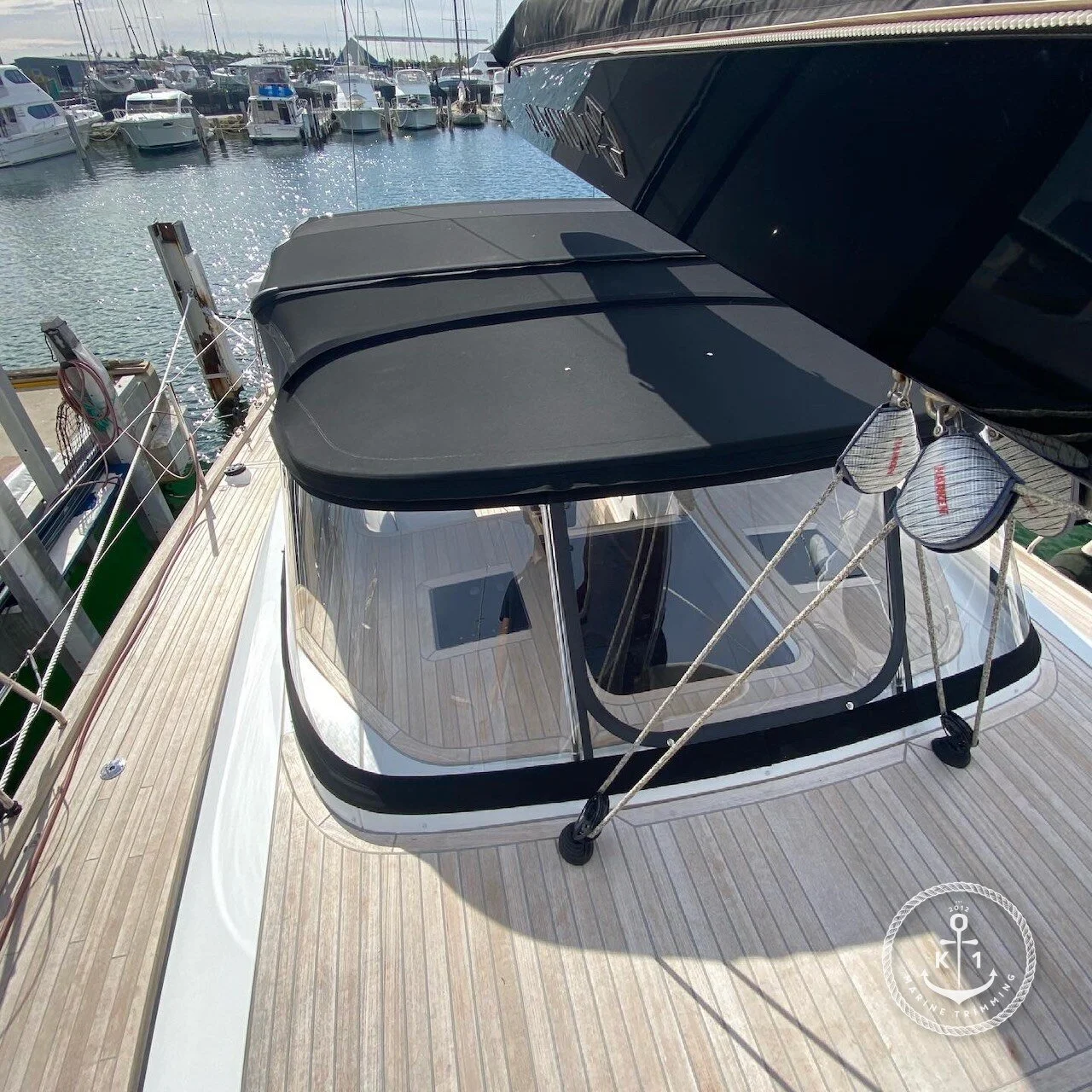  Make: CNB  Model: Bordeaux 60  Products: Yacht Dodger, Bimini, Link Sheet, Side Mesh Screens  Material: Sunbrella Acrylic Canvas (Black), Strataglass, Marine 2x2 Weave Mesh (Black)  Dodgers provide vital protection from wind, spray, and sun at the c
