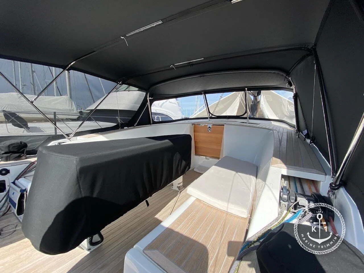  Make: CNB  Model: Bordeaux 60  Products: Yacht Dodger, Bimini, Link Sheet, Side Mesh Screens, Table Cover  Material: Sunbrella Acrylic Canvas (Black), Strataglass, Marine 2x2 Weave Mesh (Black)  Dodgers provide vital protection from wind, spray, and