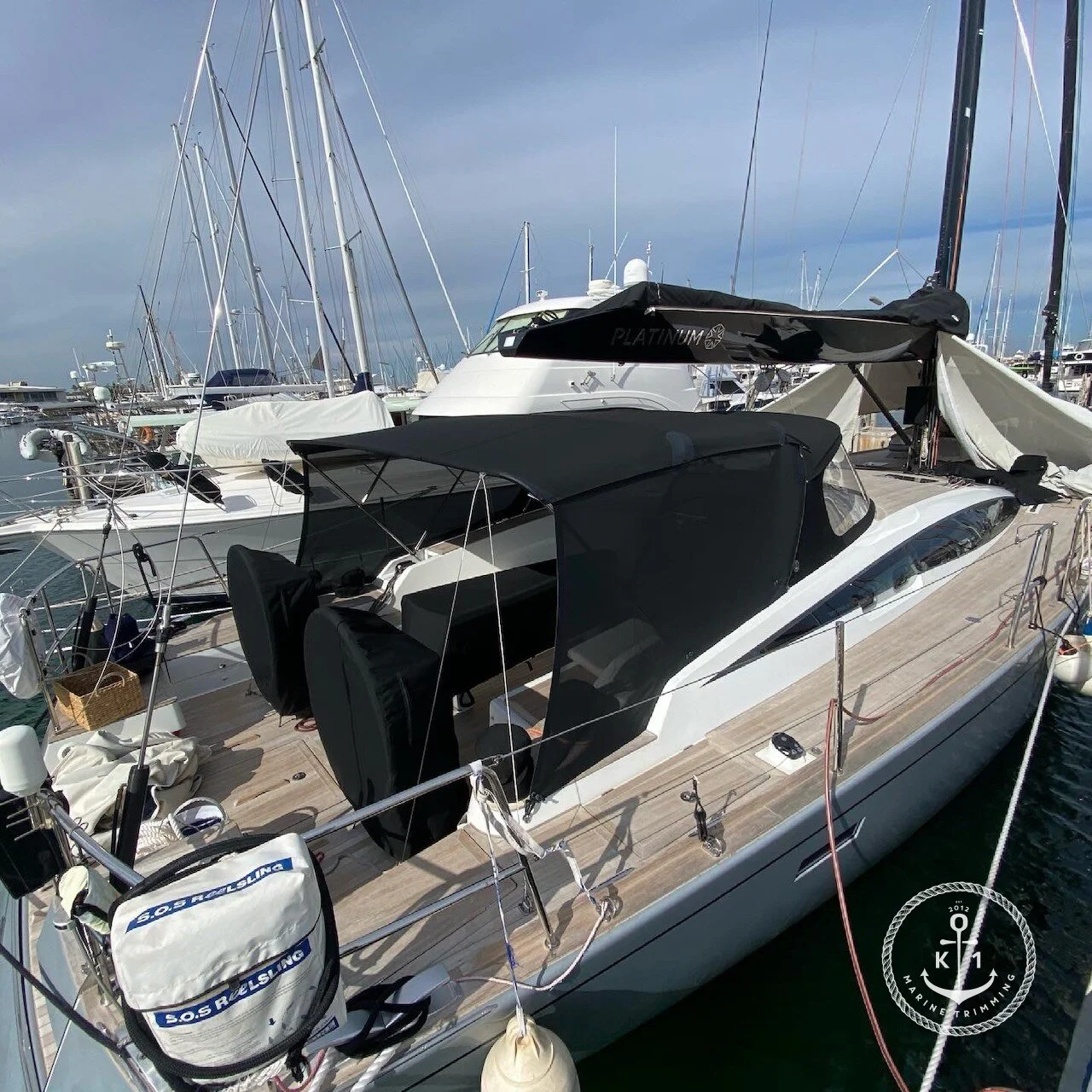  Make: CNB  Model: Bordeaux 60  Products: Yacht Dodger, Bimini, Link Sheet, Side Mesh Screens, Table Cover, Steering Wheel Covers  Material: Sunbrella Acrylic Canvas (Black), Strataglass, Marine 2x2 Weave Mesh (Black)  Dodgers provide vital protectio