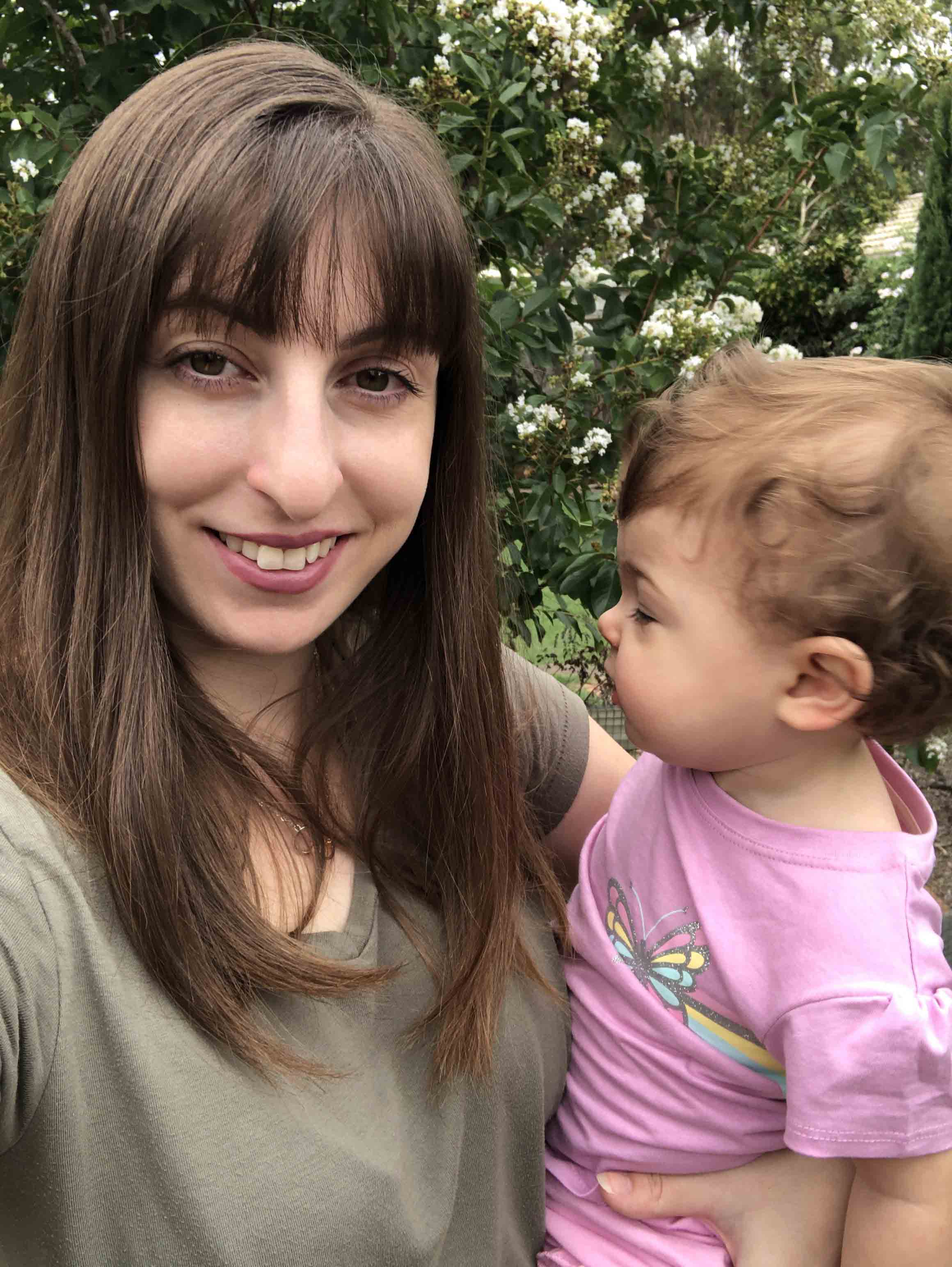 Best I could do! This is what happens when your Border Collie is bouncing around you and your baby refuses to look at the camera.