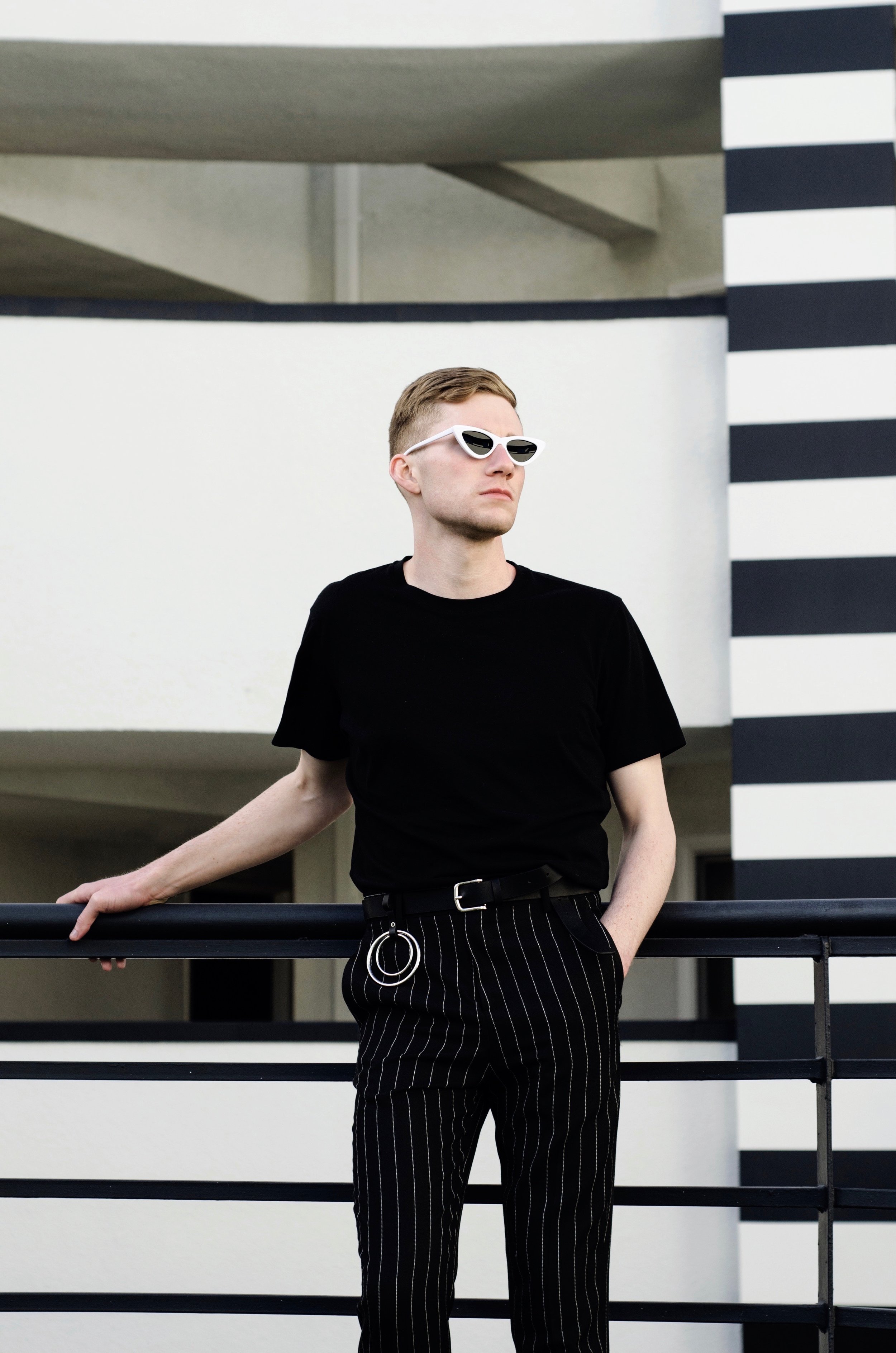 Wearing Uniqlo T-shirt , Zara trousers , ASOS belt and belt accessory , Le Specs sunglasses