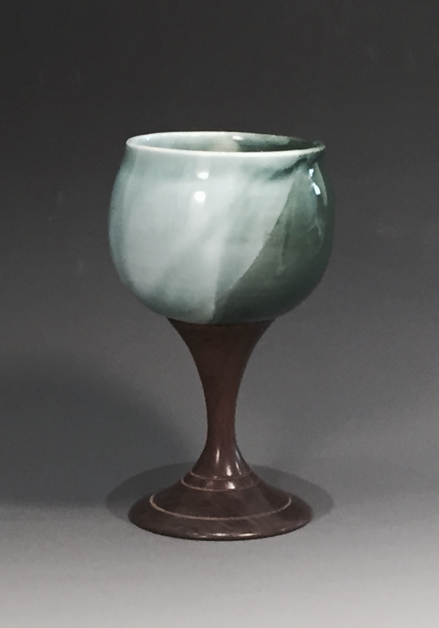 Ceramic cup by Elaine Shore and wooden base by Tom Kingshill.