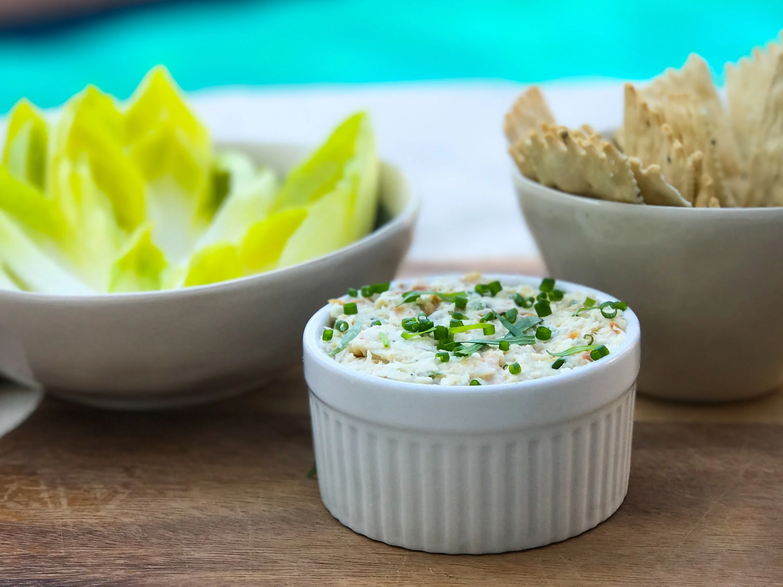 This year's Bastille Day feast starts with make-ahead smoked trout pâté, served with crackers and endive leaves.