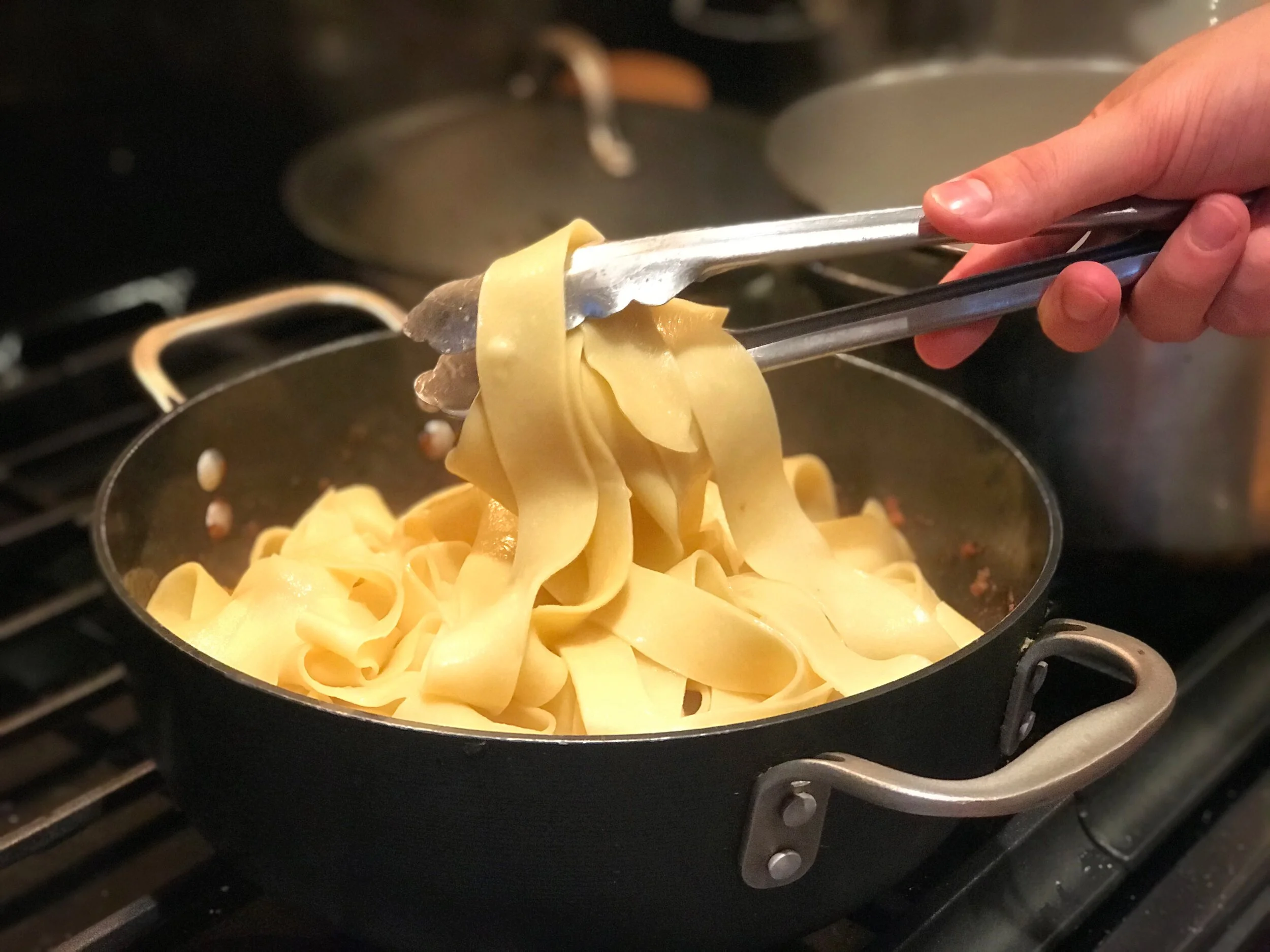 PappardelleCooksSauce.jpg