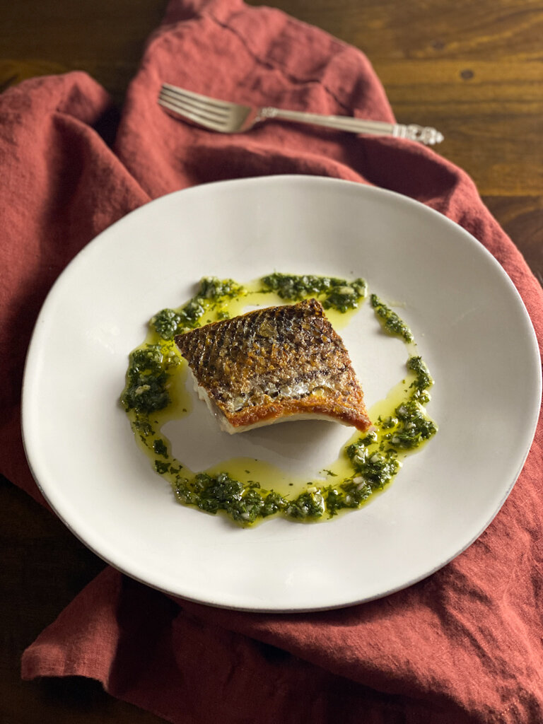 Crispy-Skinned Striped Bass with Tangy Green Everything Sauce — Cooks  Without Borders