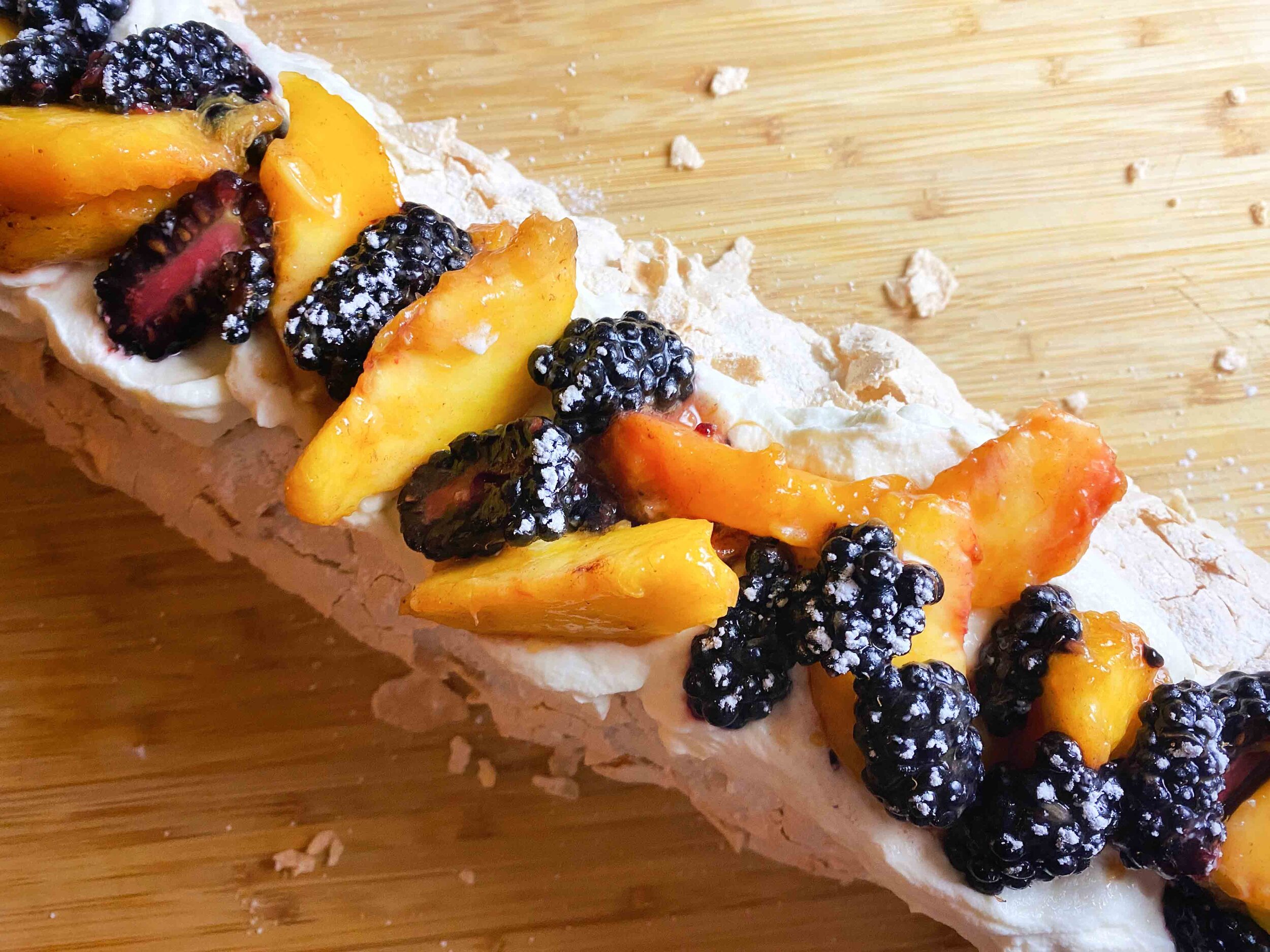 Rolled Pavlova with Peaches and Blackberries