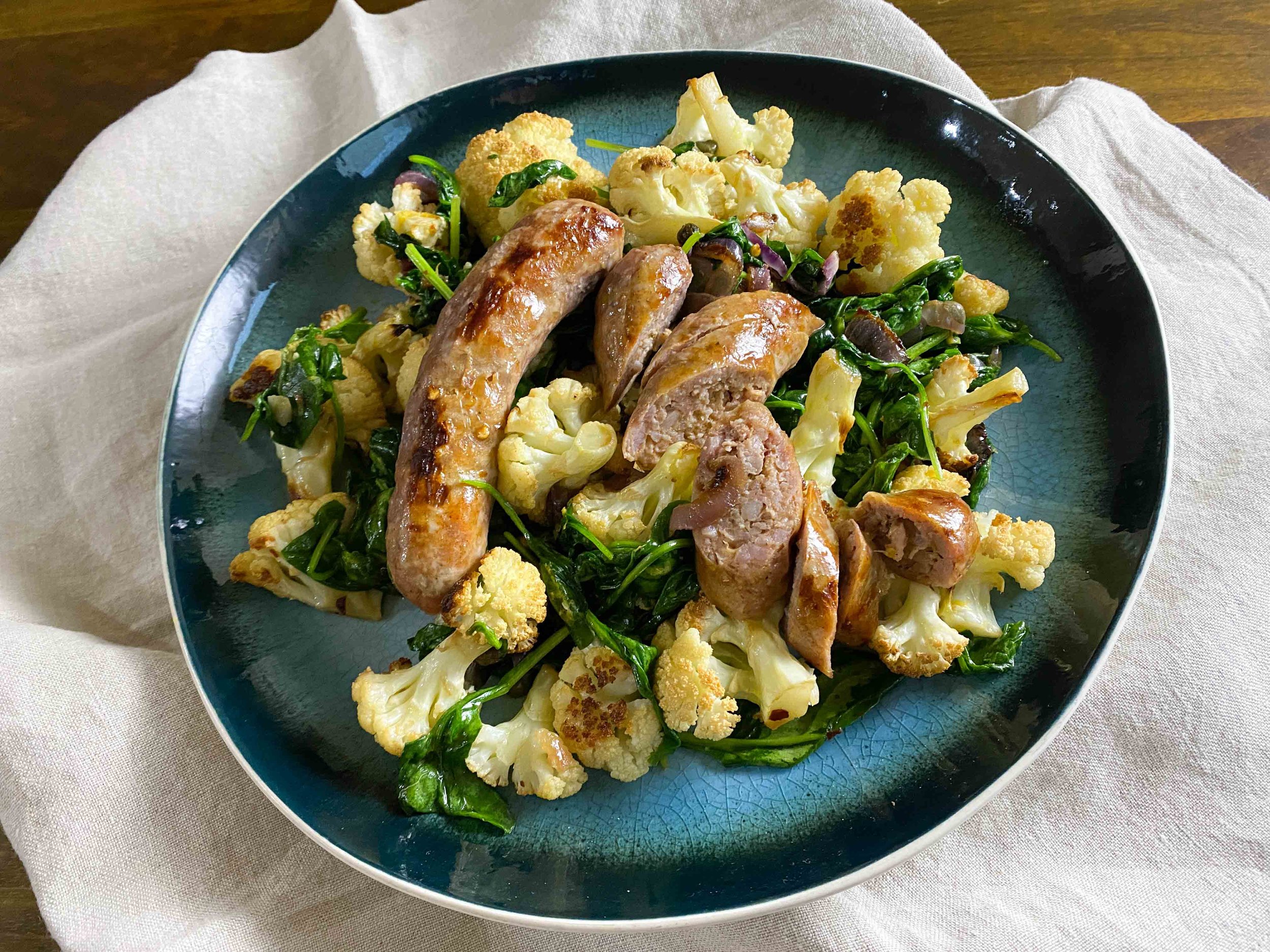 Italian Sausages with Roasted Cauliflower and Greens