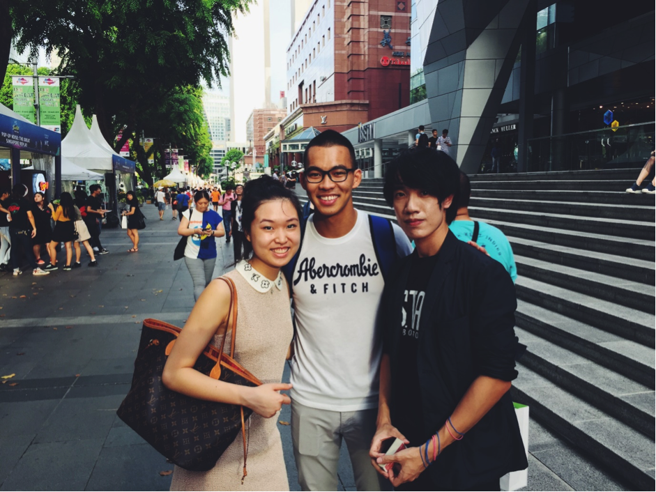  Magician Elijah taking a group photo with his newly acquainted fans.