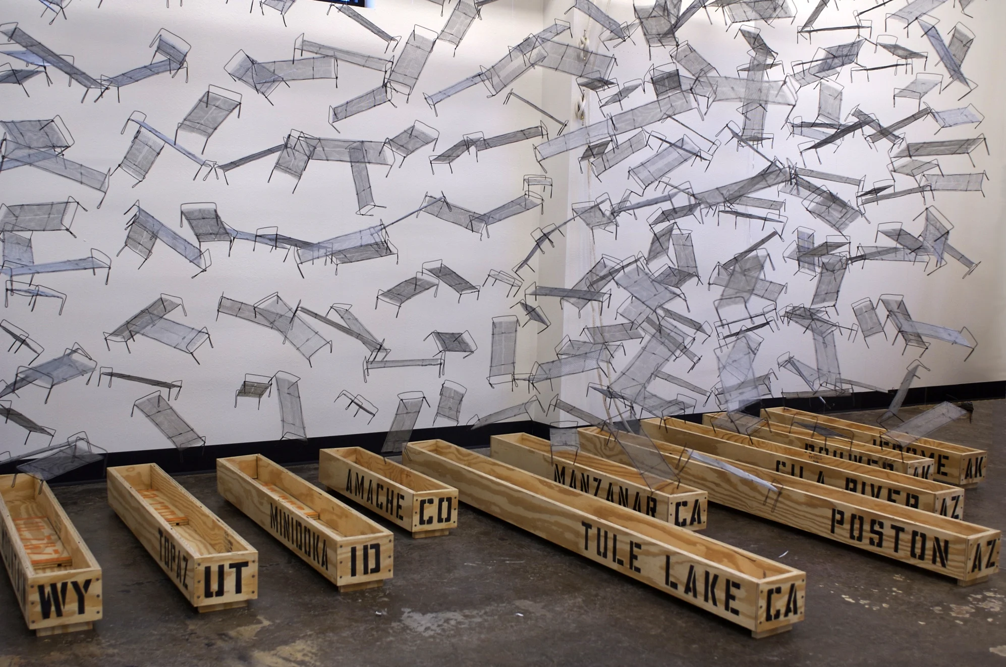 Life Interrupted: The Internment Camps, plywood, wire, wire mesh, spray paint, 6' x 11' x 7'