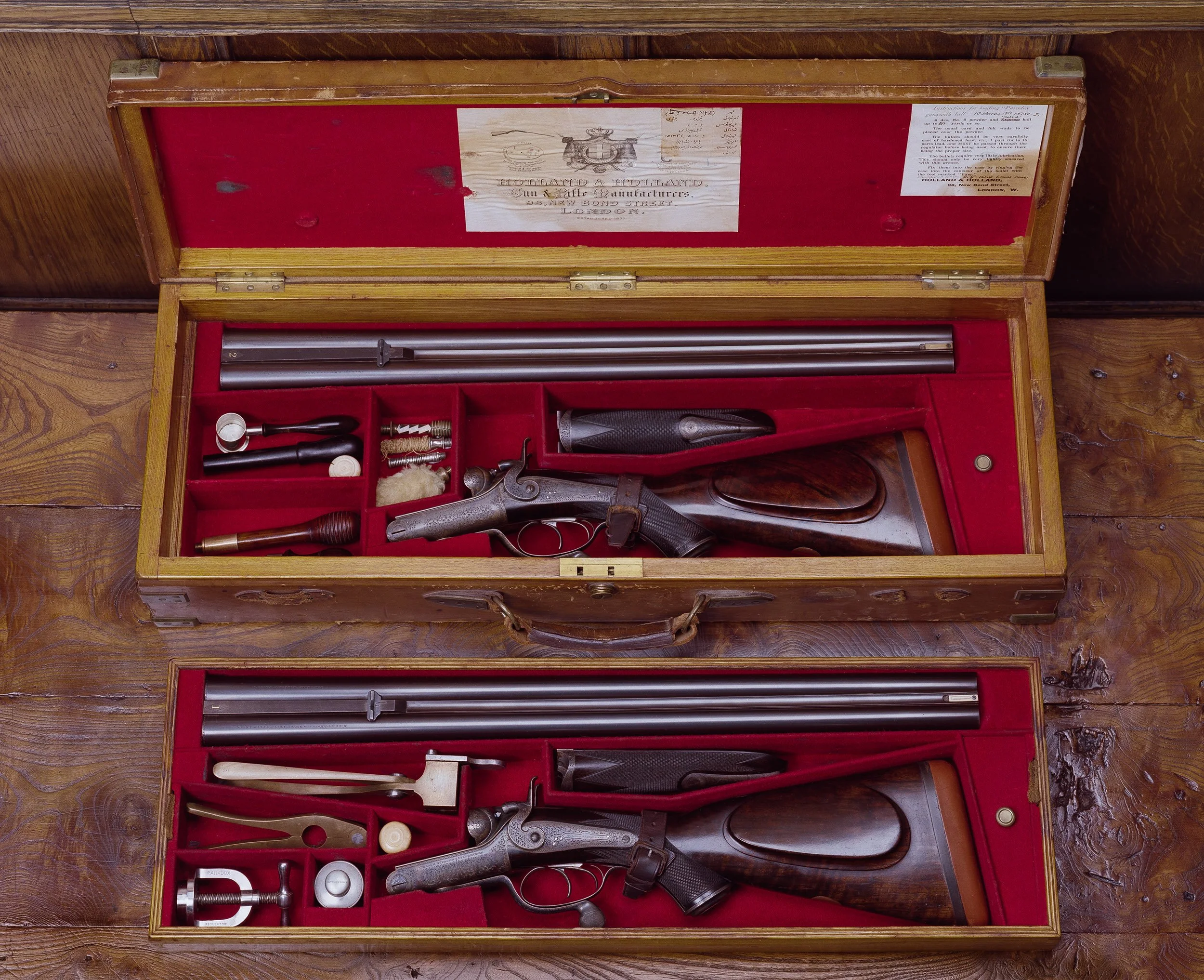 Holland & Holland 1894 pair of 10-bore Paradox guns in case.