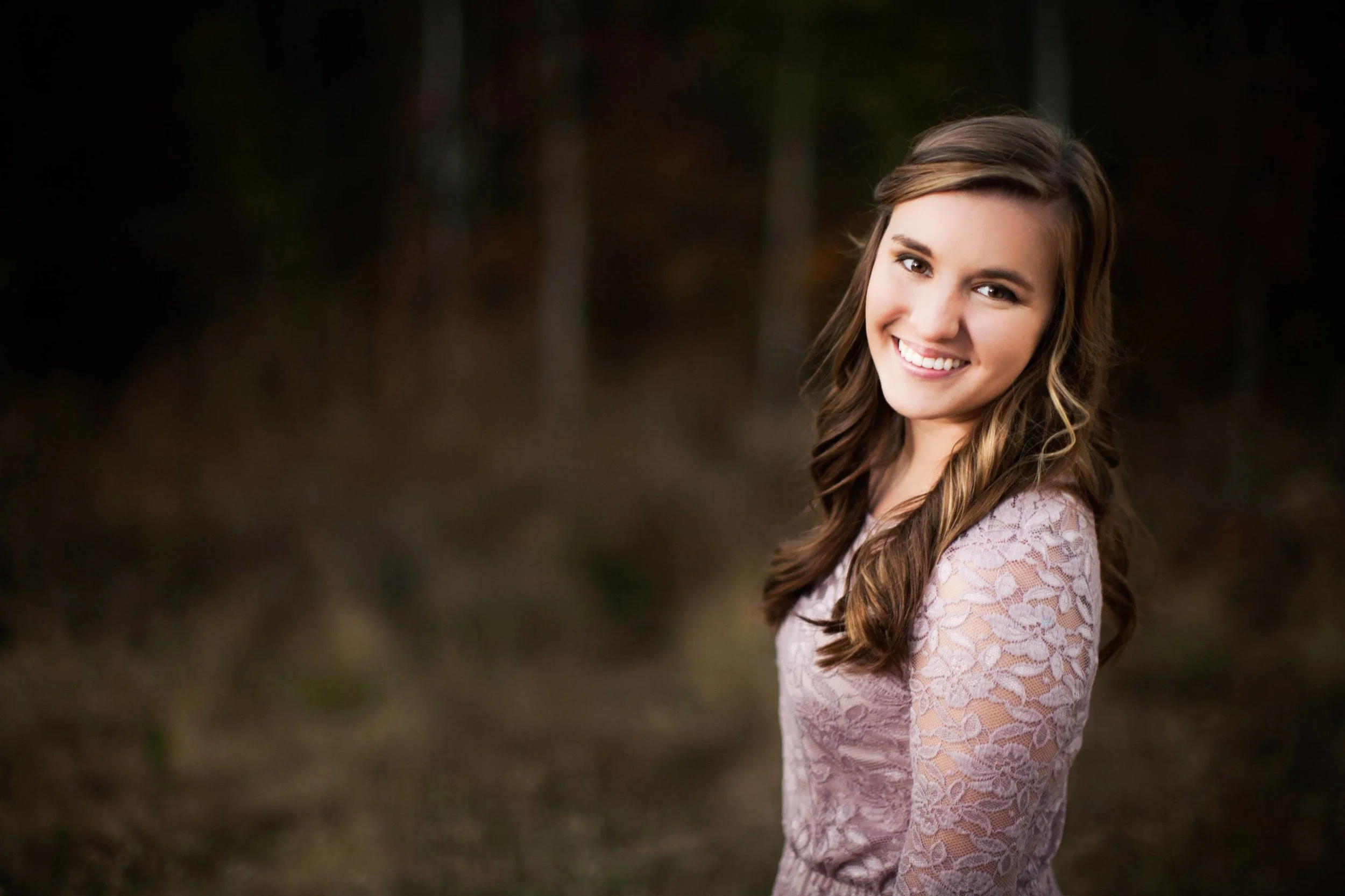 Senior photos in a field at West Monroe, Louisiana.