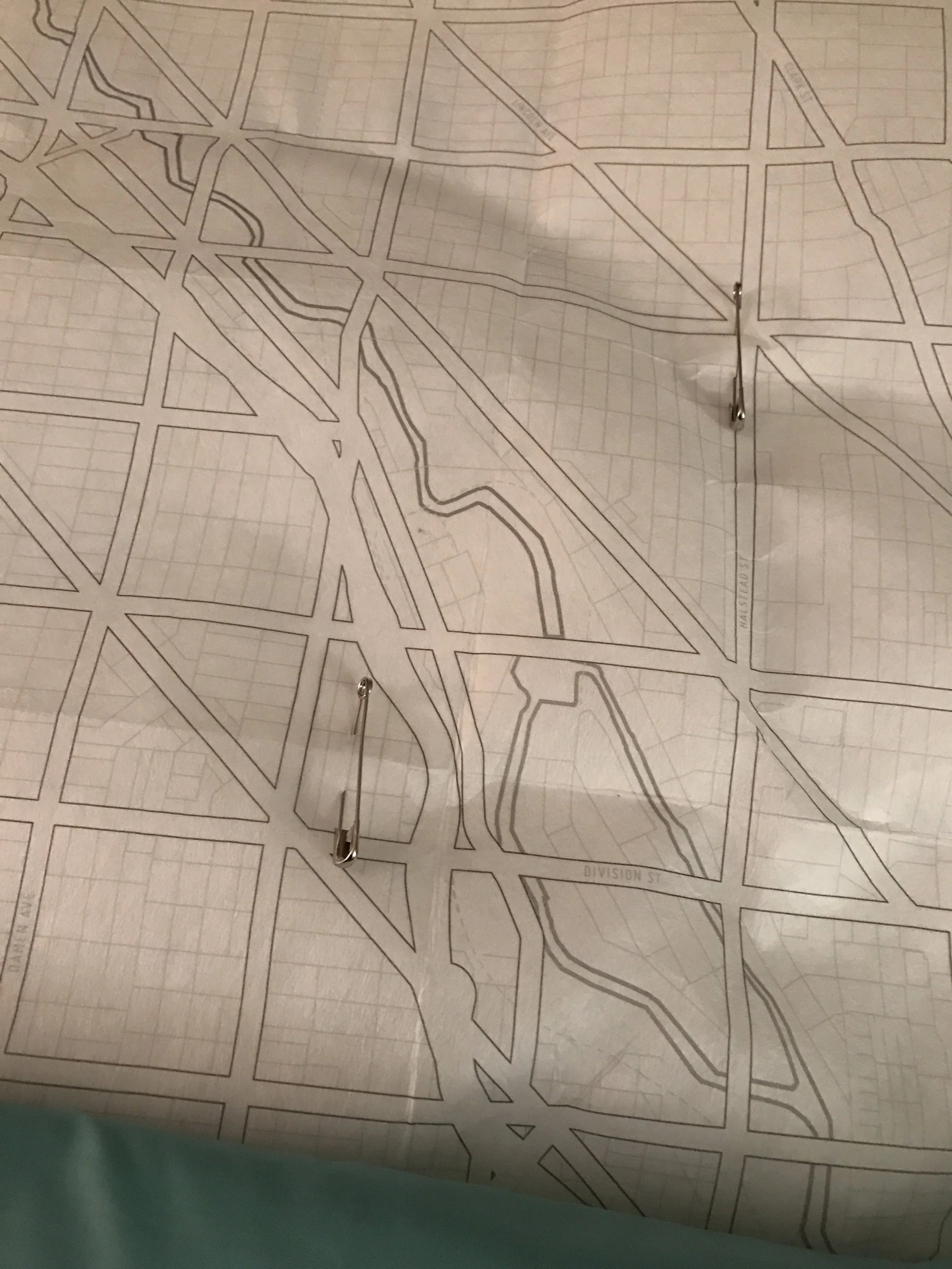 Safety pinning the map template to the fabric and batting sandwich! 