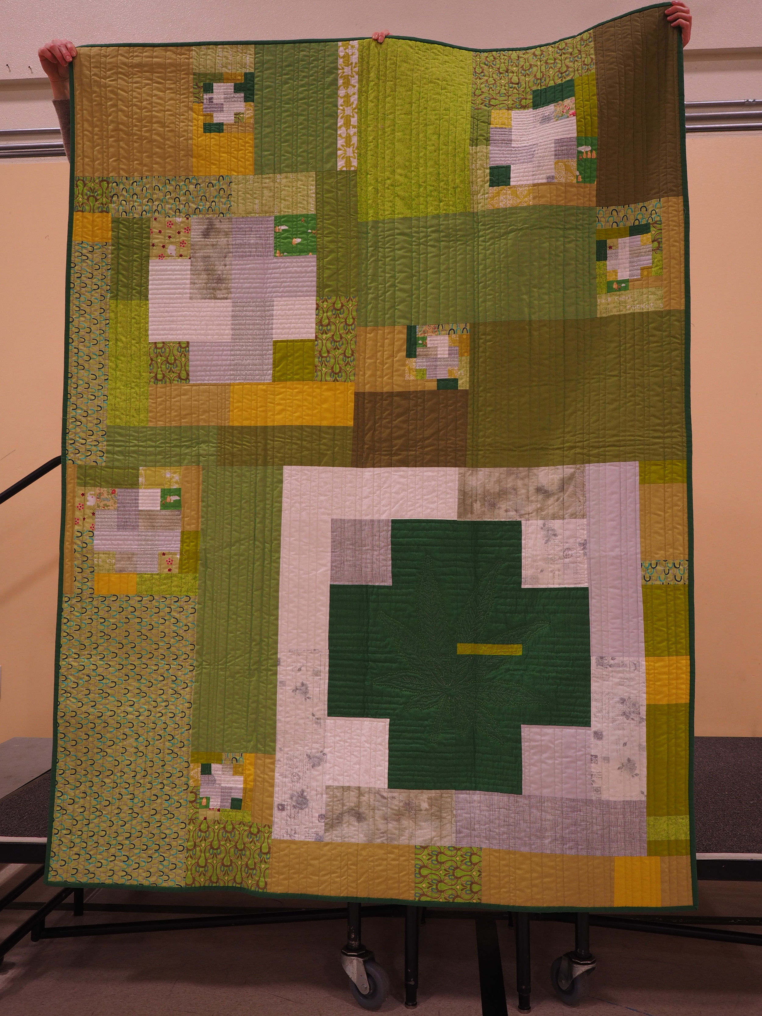   Gail Weiss   Green Cross Quilt  @gweiss23  Modern Cross Block by Susan Beal  Created to commemorate the passing of measure 91 (cannabis legalization) - Her QuiltCon Reject    