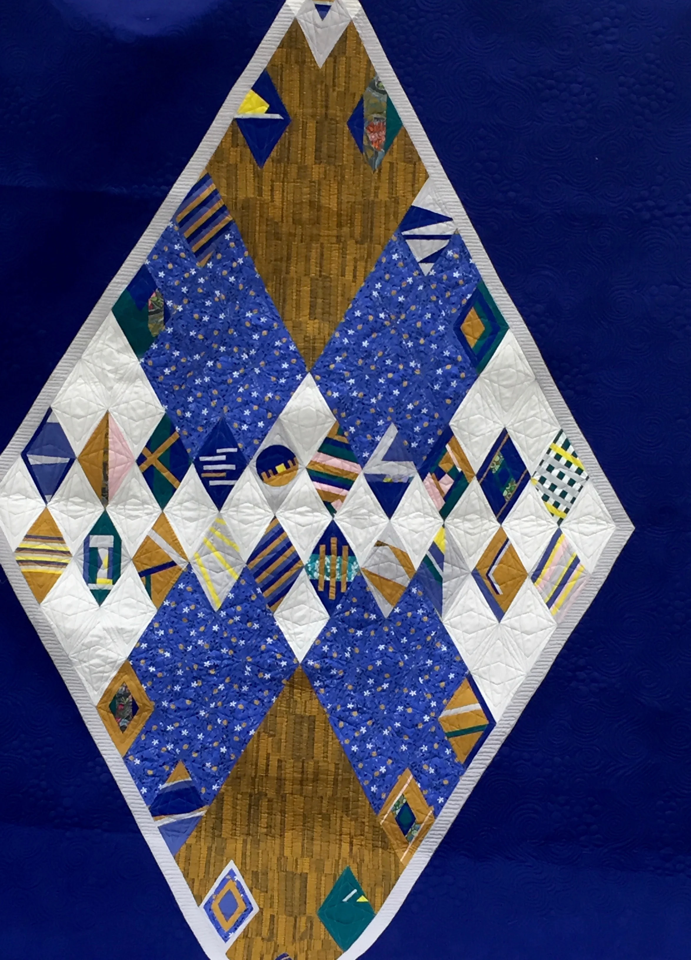 Made to Scale, PMQG's 2017 QuiltCon Charity Quilt, made by AnnMarie Cowley and other PMQG members -- thank you for naming our quilt, January meeting goers!