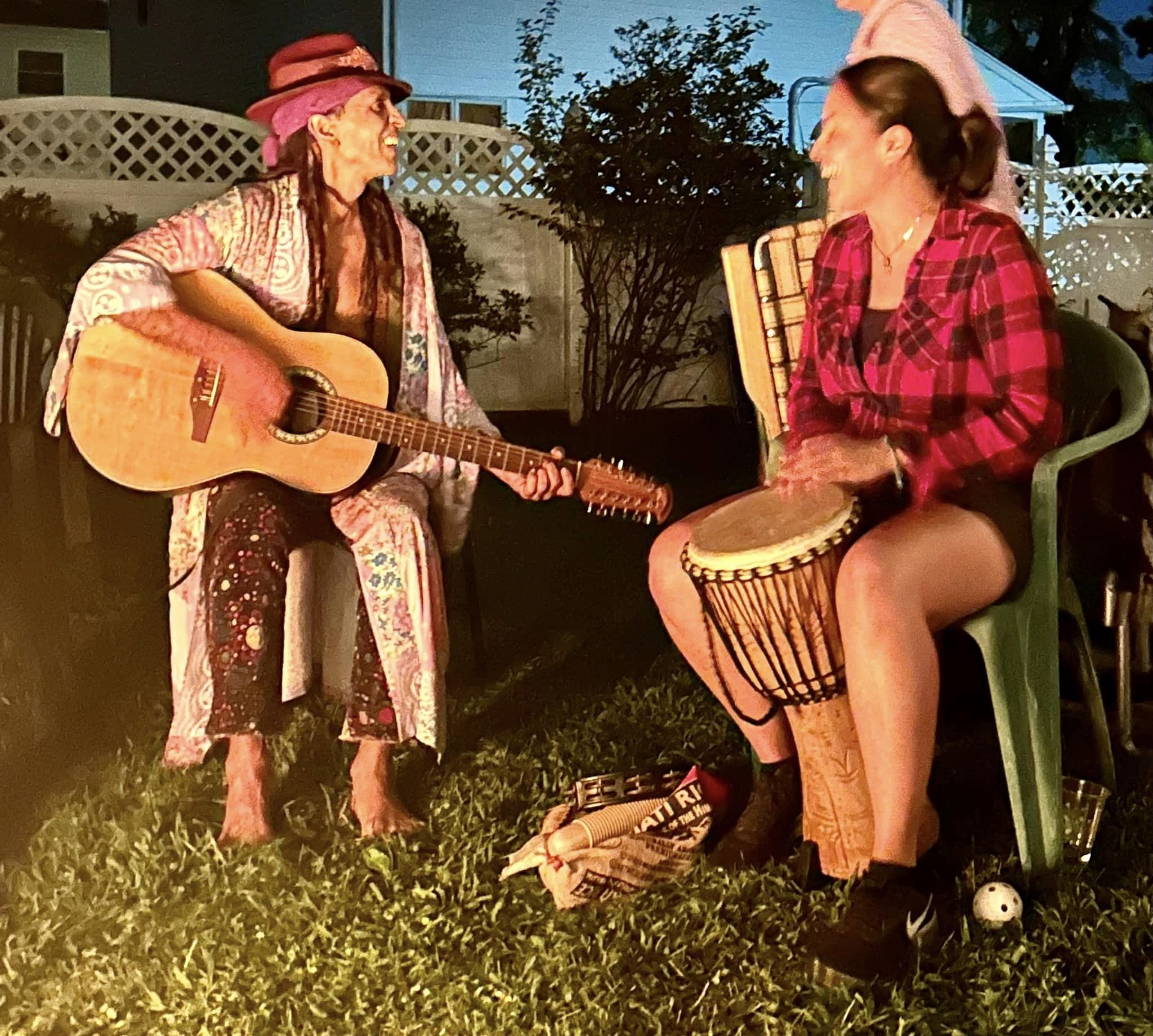 New York based drum circle faciltator laura cerrano with Fantuzzi at an music improv jam session.jpeg