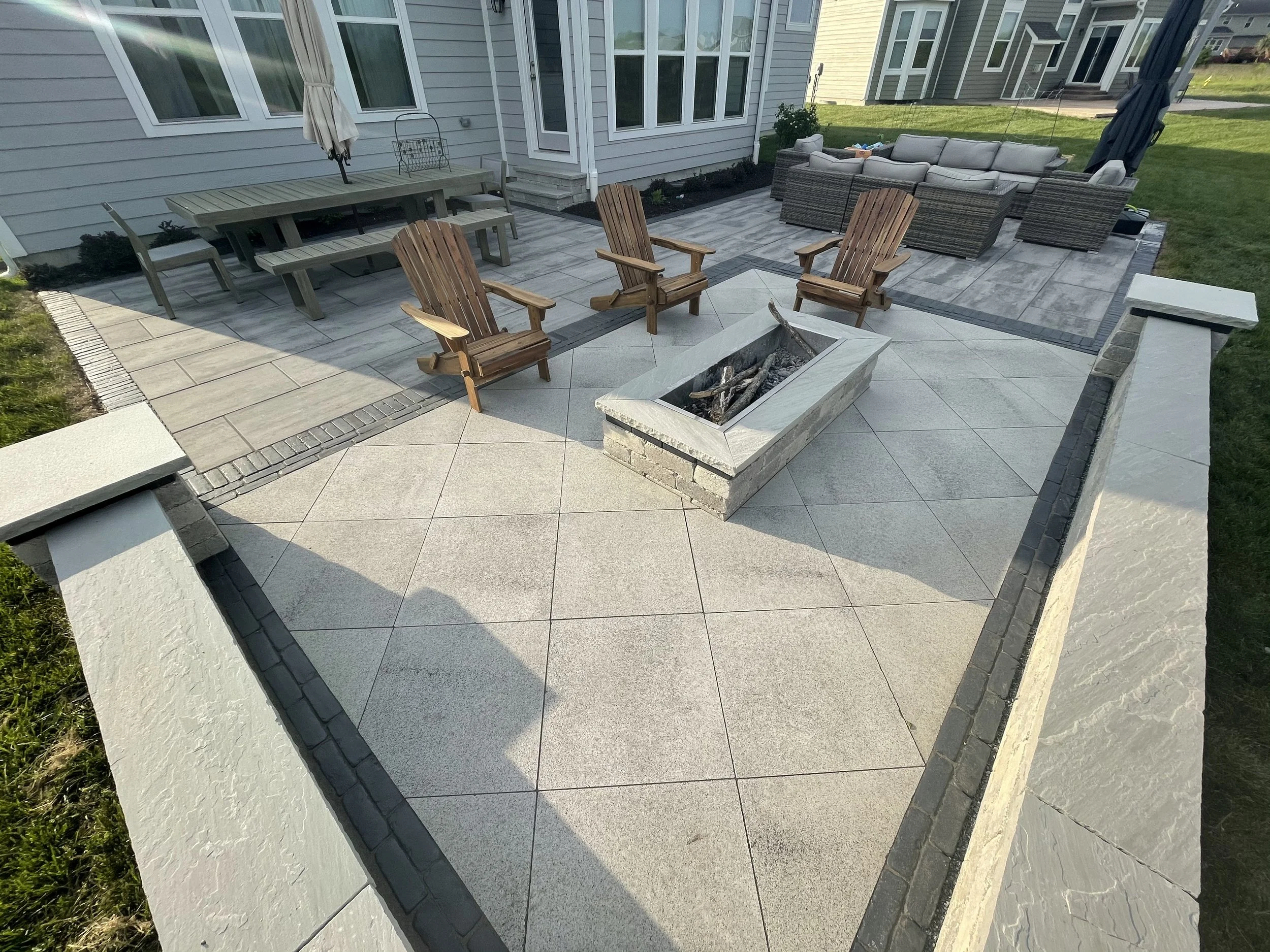 Patio with designated firepit area- Centerville