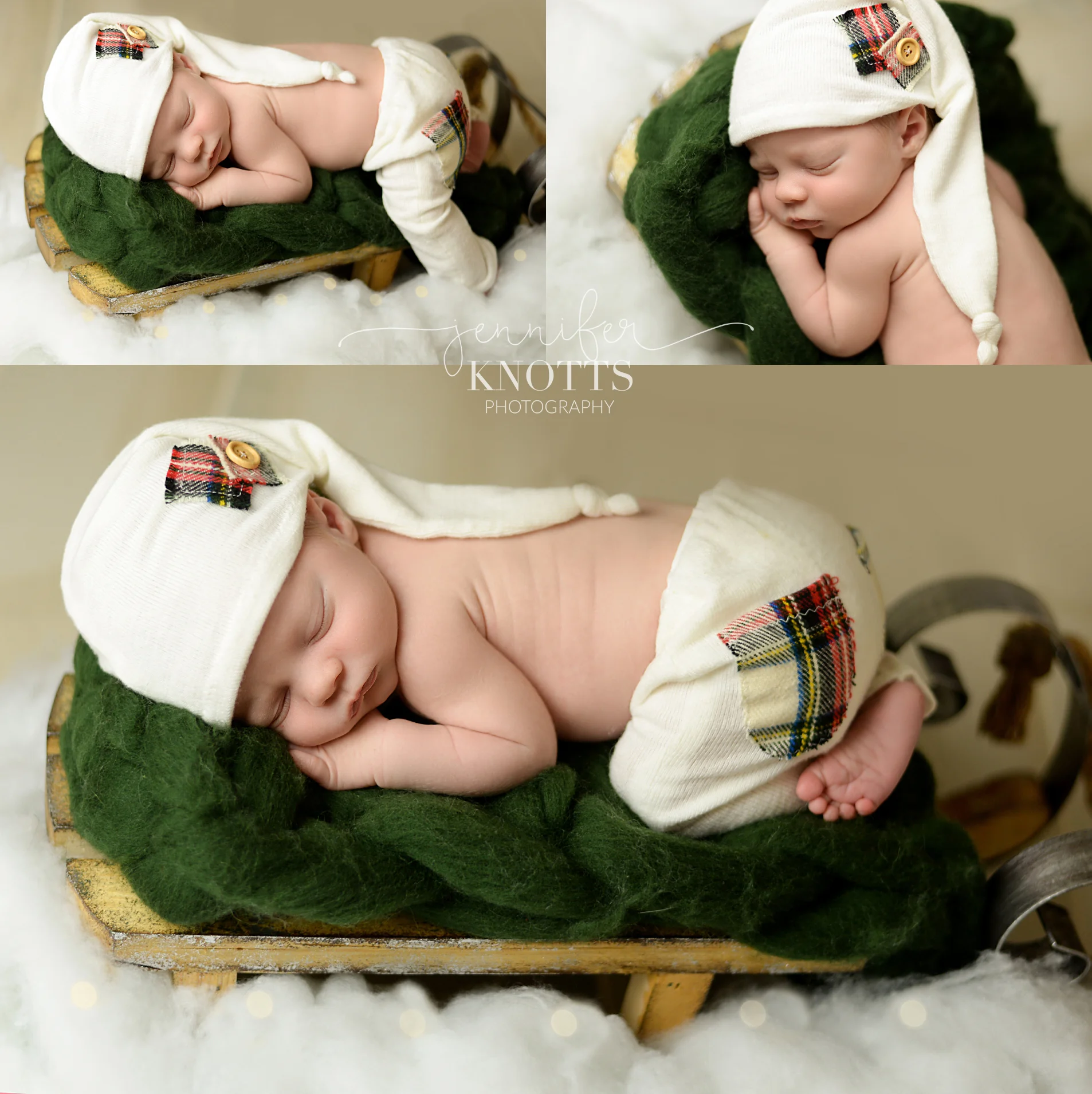 baby boy sleeps on sled prop wearing white hat and outfit