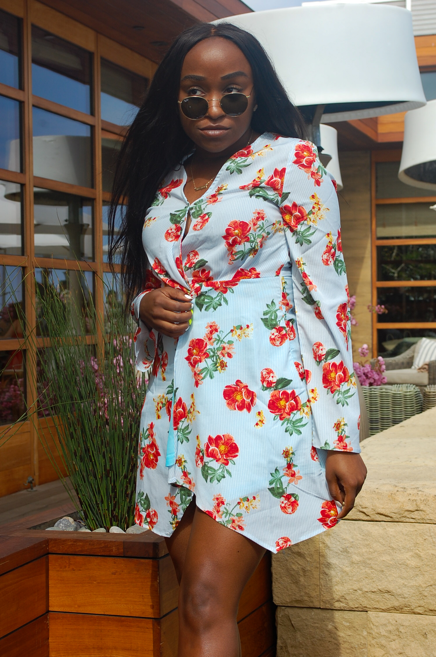 THE DEETS: Long Sleeve Mini Wrap Dress - ASOS ; Strappy Block Heel Sandals - Steve Madden ; Round Metal Sunglasses - Ray-Ban ; Ellie Gold Stud Earrings - Kendra Scott ; Leather Pouch Clutch - Madewel l