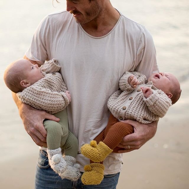 Teeny tiny twins in knitted jumpers and booties in daddy&rsquo;s arms. What&rsquo;s not to swoon over !!! @iris.and.me