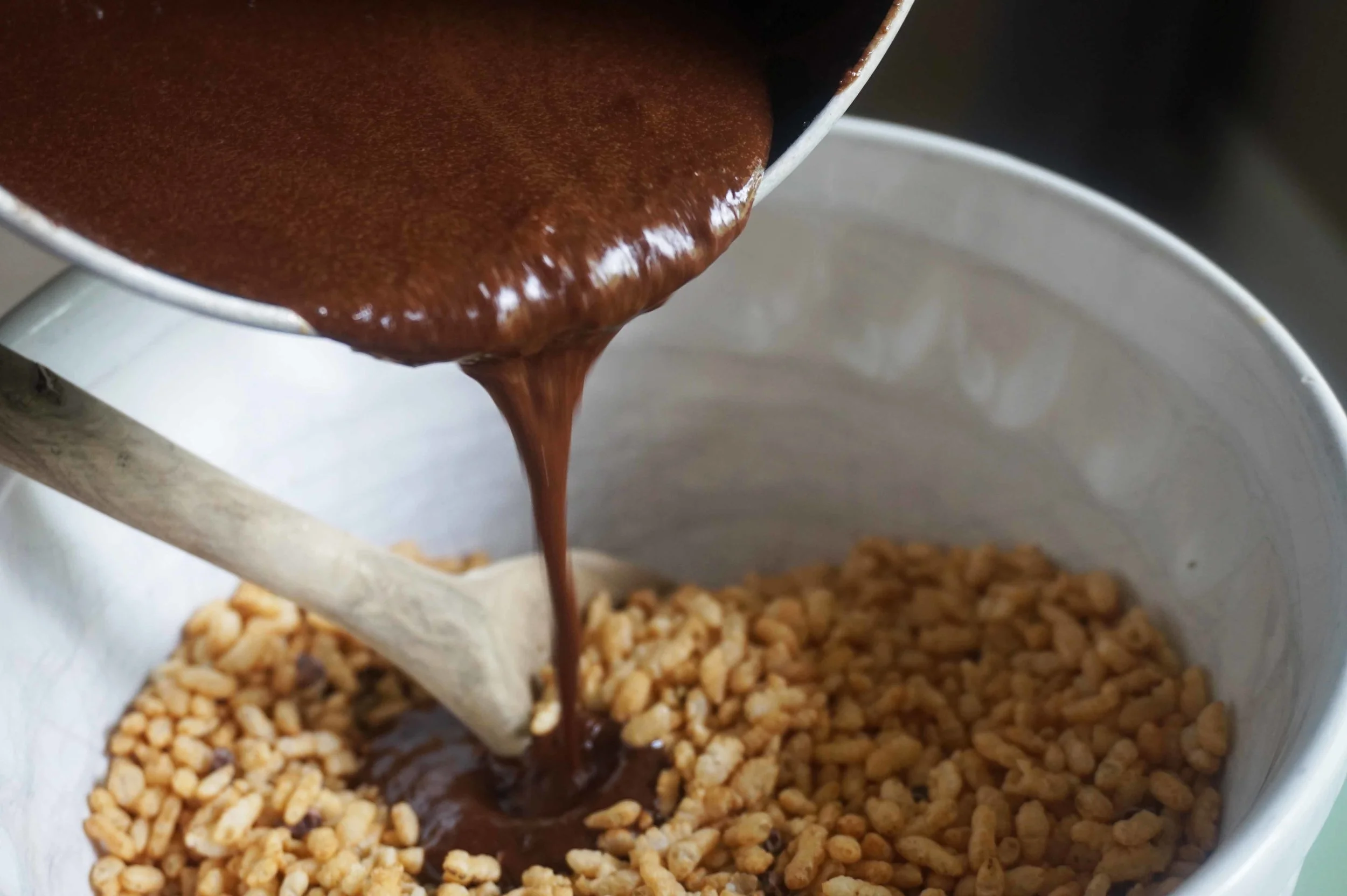 Pour chocolate mixture over rice crisps and stir to coat evenly.