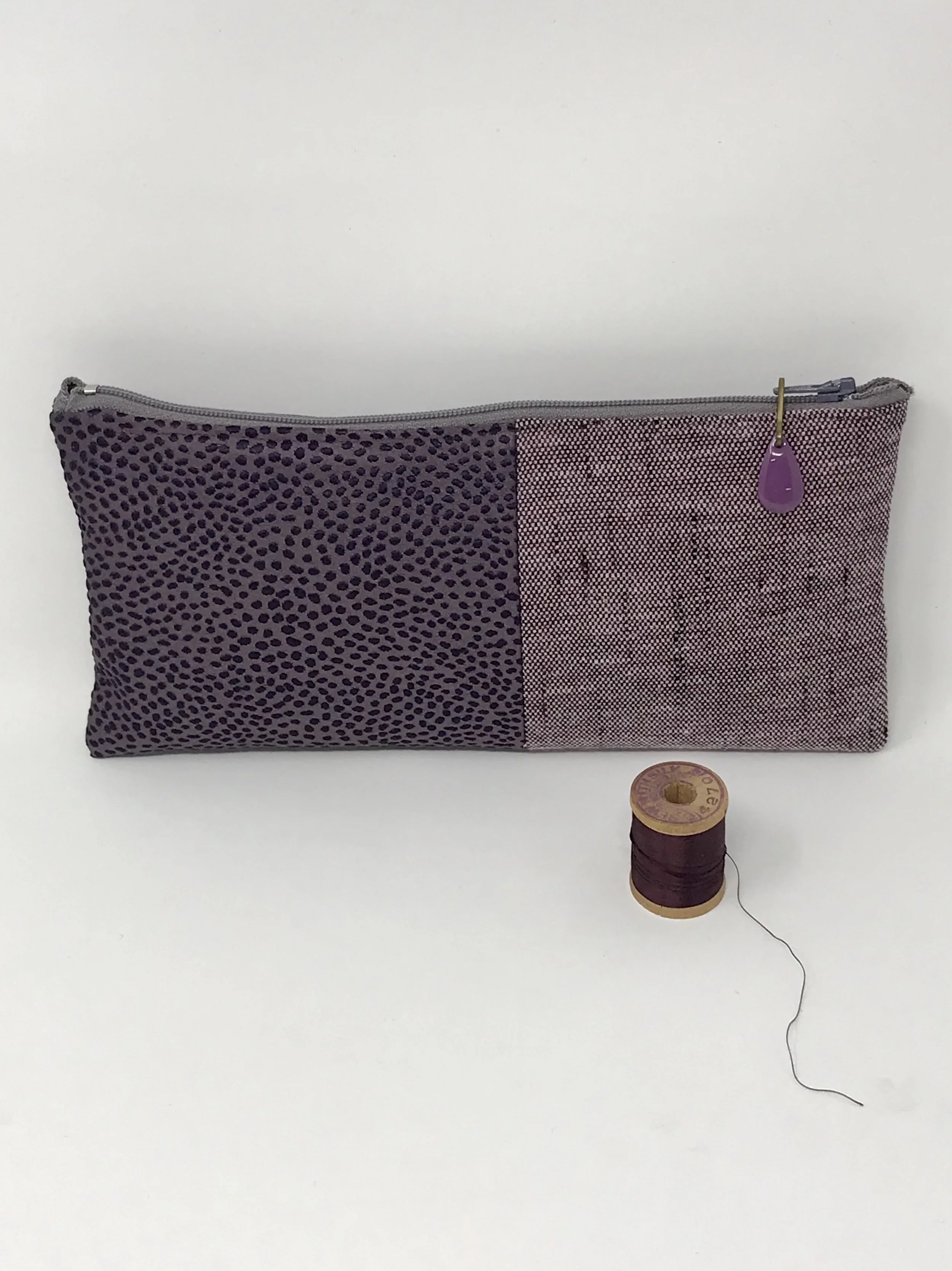 clutch pebble amethyst.jpg