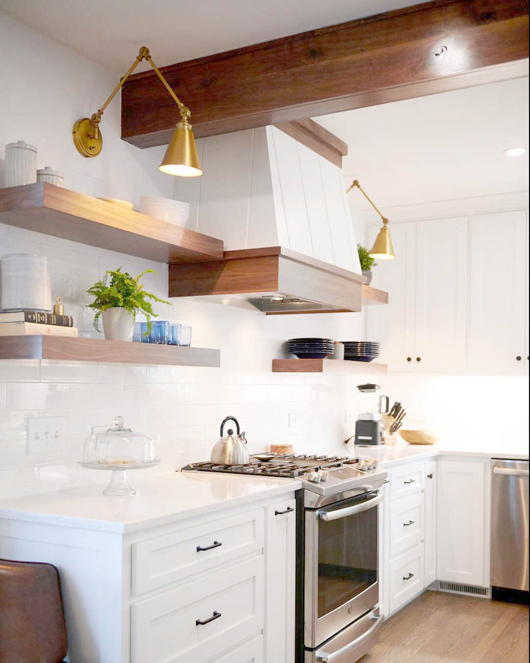 white-kitchen-with-wood-shelves-and-beams.jpg