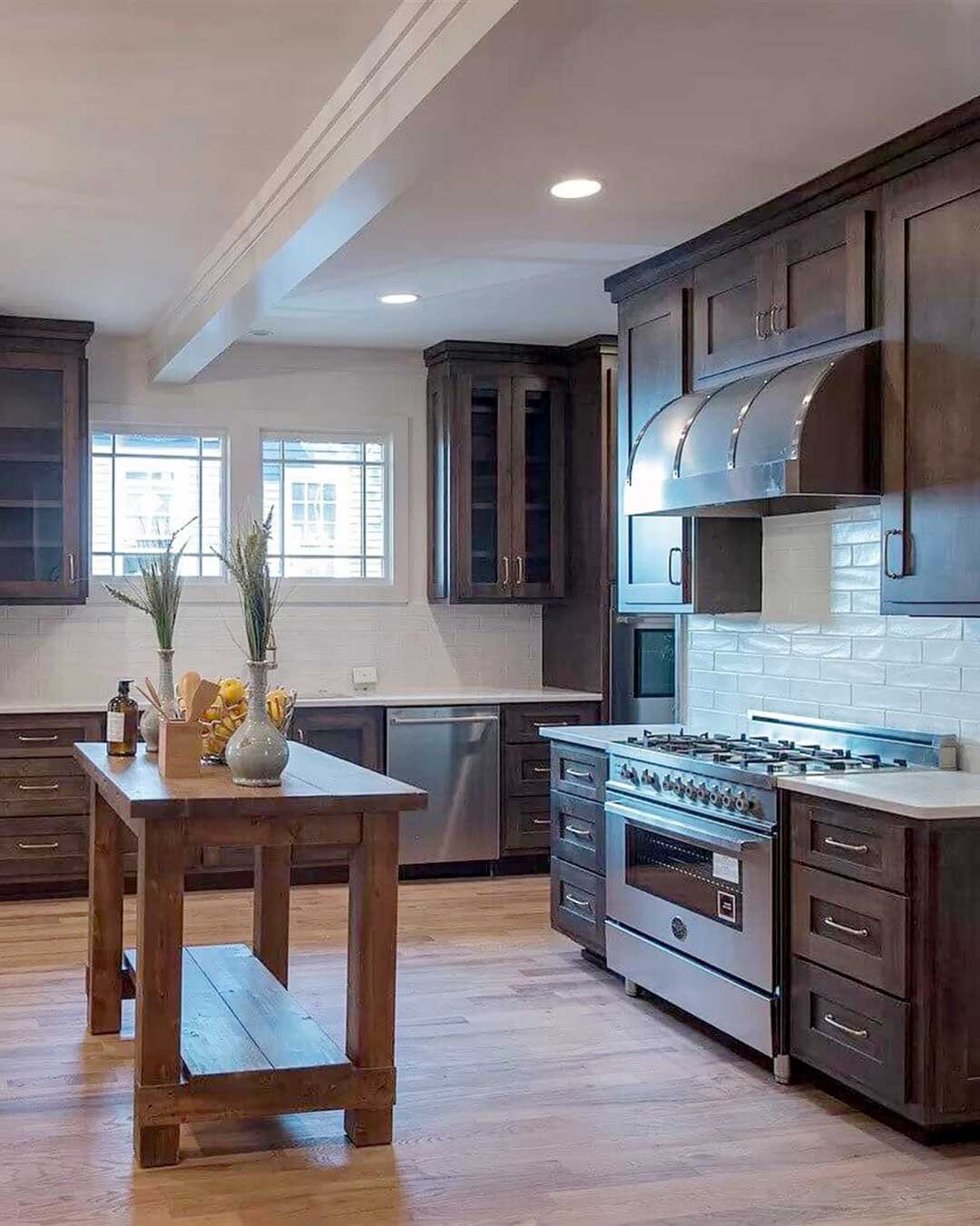 wood-cabinets-barrel-metal-hood-prep-island.jpg