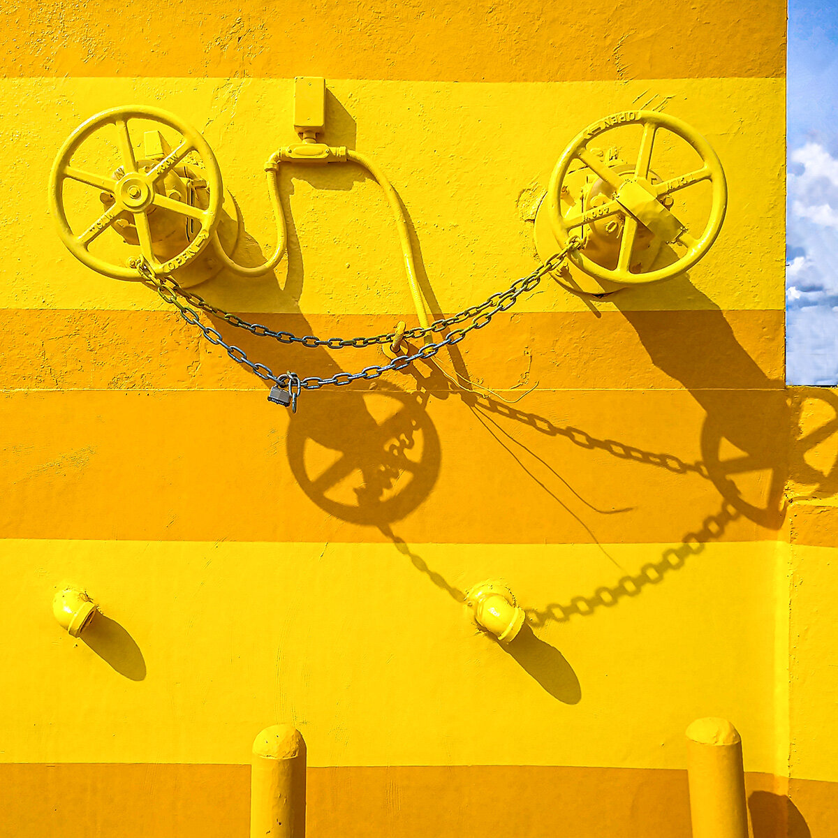 09-18-20 Ardens Garden bike ride Daddy Carson yellow wall shadows_square IG_final.jpg