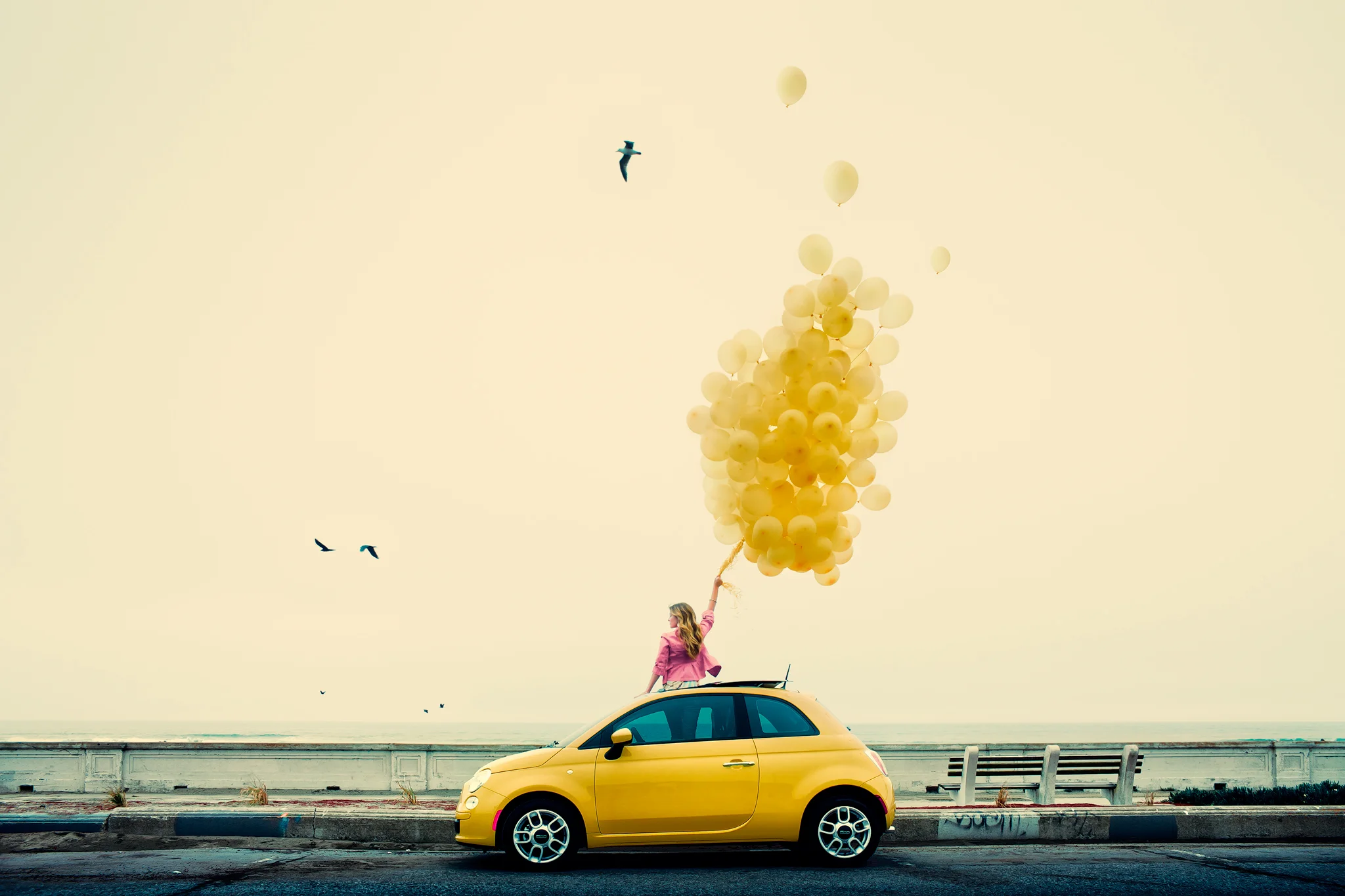 The above Fiat is called the 500 Pop. In a moment of madness while shooting this car, I decided it would be fun to get the talent to hold a large bouquet of yellow balloons. Our art department delivered in spades, showing up with hundreds of them. I think it ended up being everybody's favorite shot from the campaign.