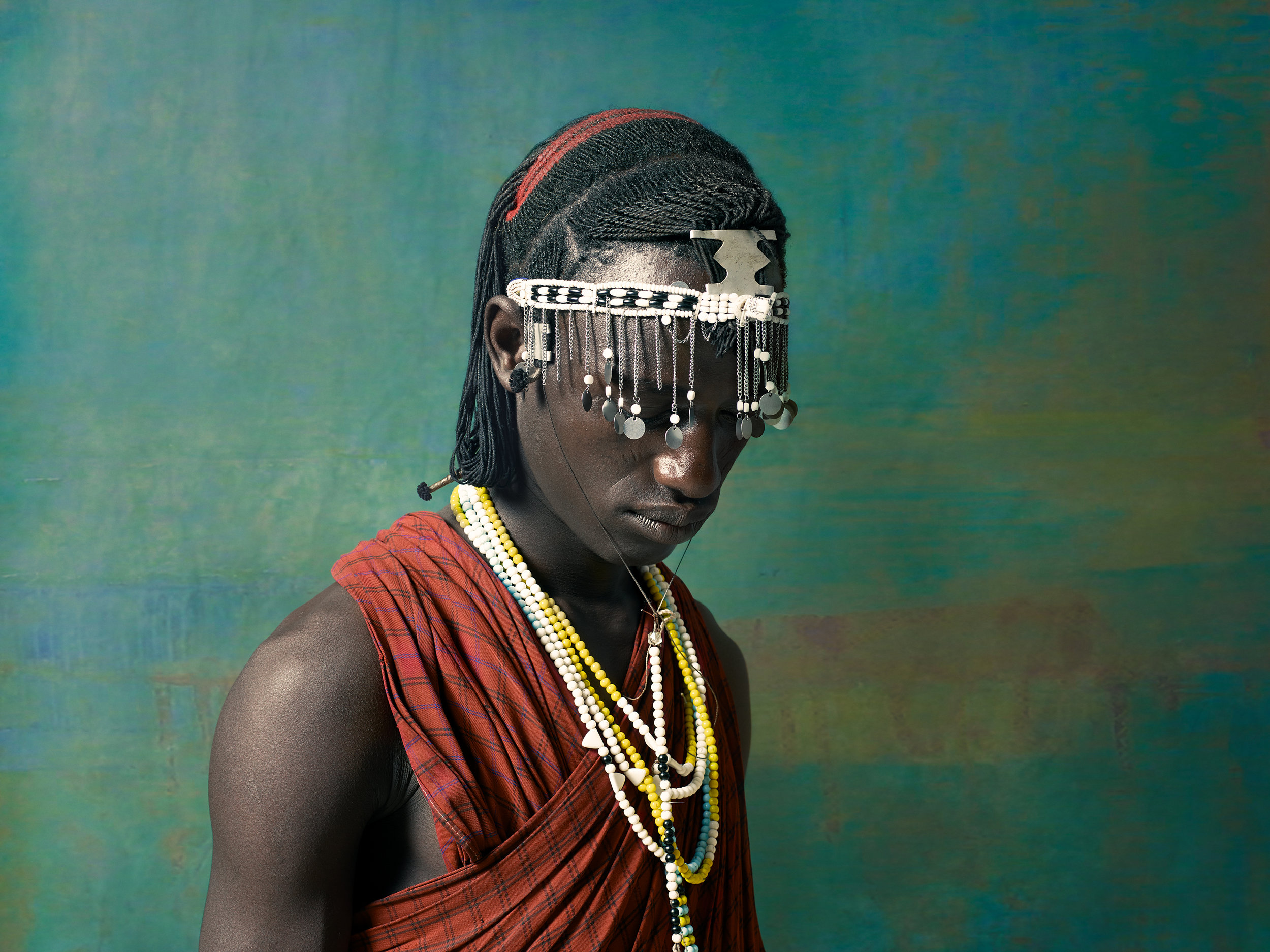 Above, portraits of young Maasai warriors.