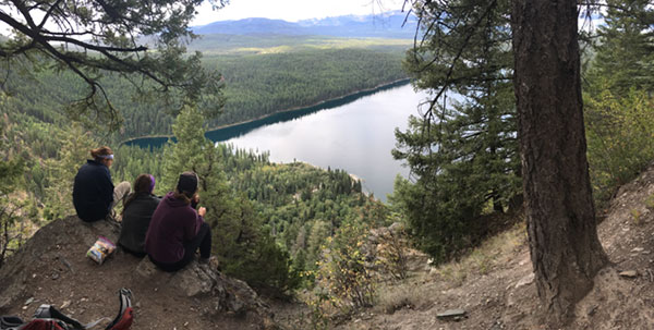 Students enjoy some of the first clear views of Holland Lake on our way up the canyon