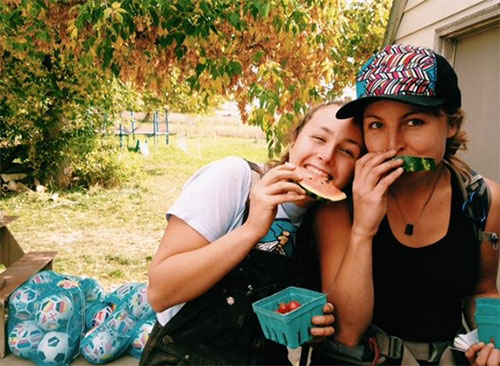 Lydia and Lucy munch on juicy drippy watermelon and sweet sweet cherry tomatoes, just a fraction of the delicious, decadent produce that Nicole and Cale sent home with us.