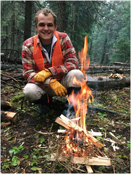 Success! Twig bundle, kindling, and feather sticks all his.