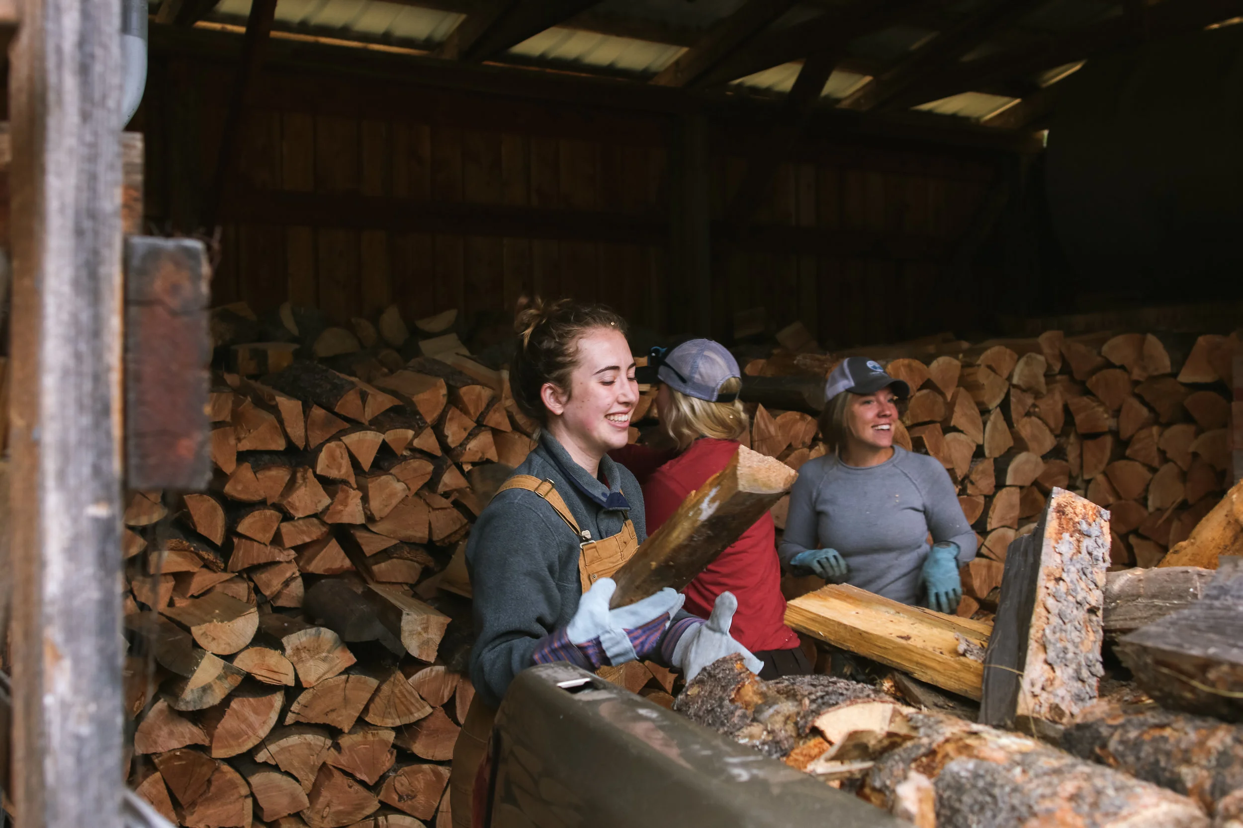 L&L students Addison Doporto & Lily Lang and former SVC Education Coordinator Sara Halm delivering firewood to community members in need. Photo by Andrea DiNino