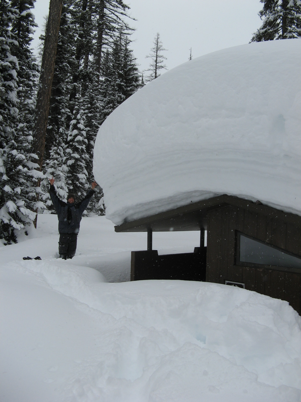 Mike Mayernik showing snow depth.