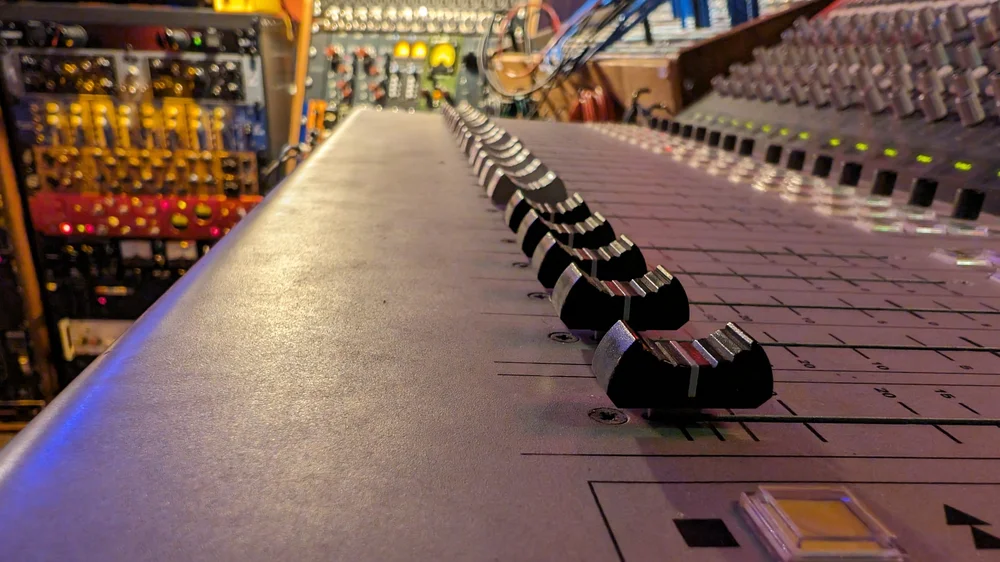Close-up along the Focusrite console faders