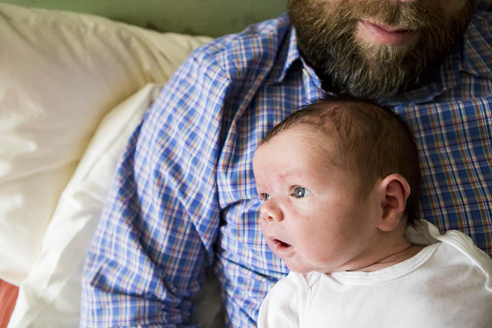 New Haven newborn photography featuring father and newborn son