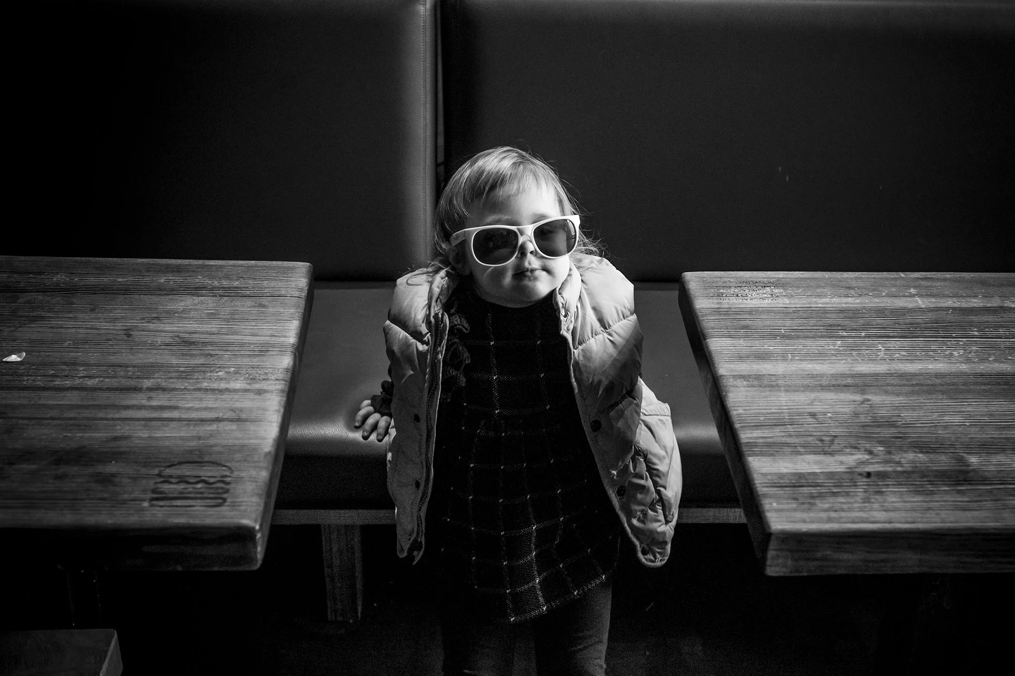 Candid toddler portrait at shake shack in New Haven, connecticut. 