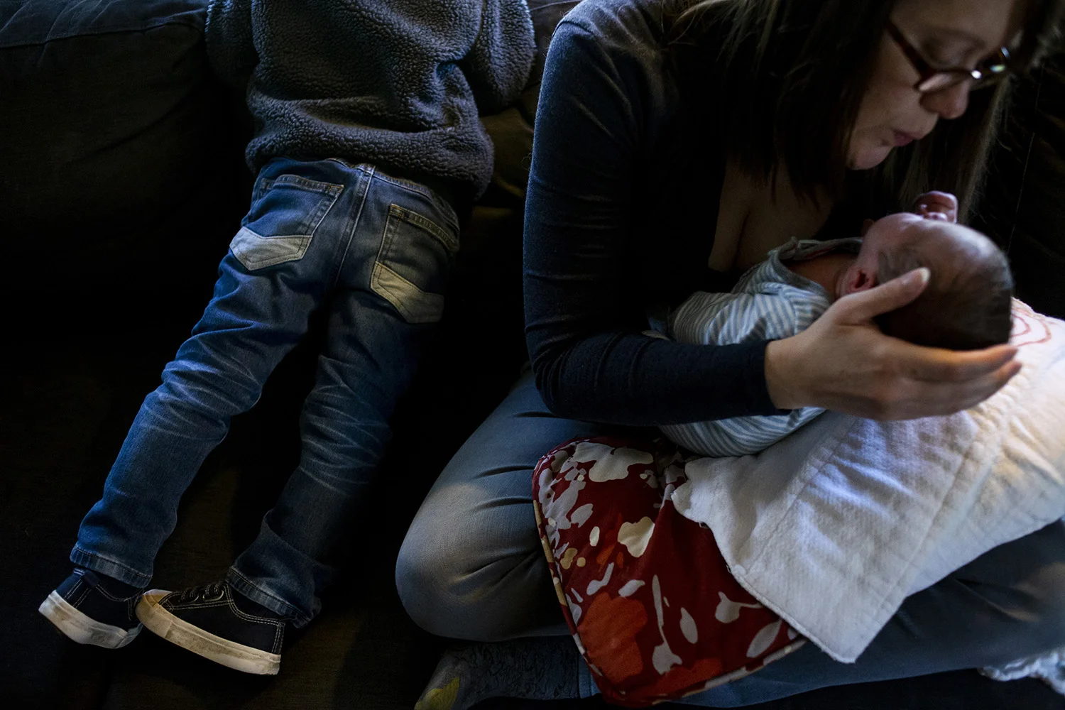 Real life family photography with newborn and toddler.
