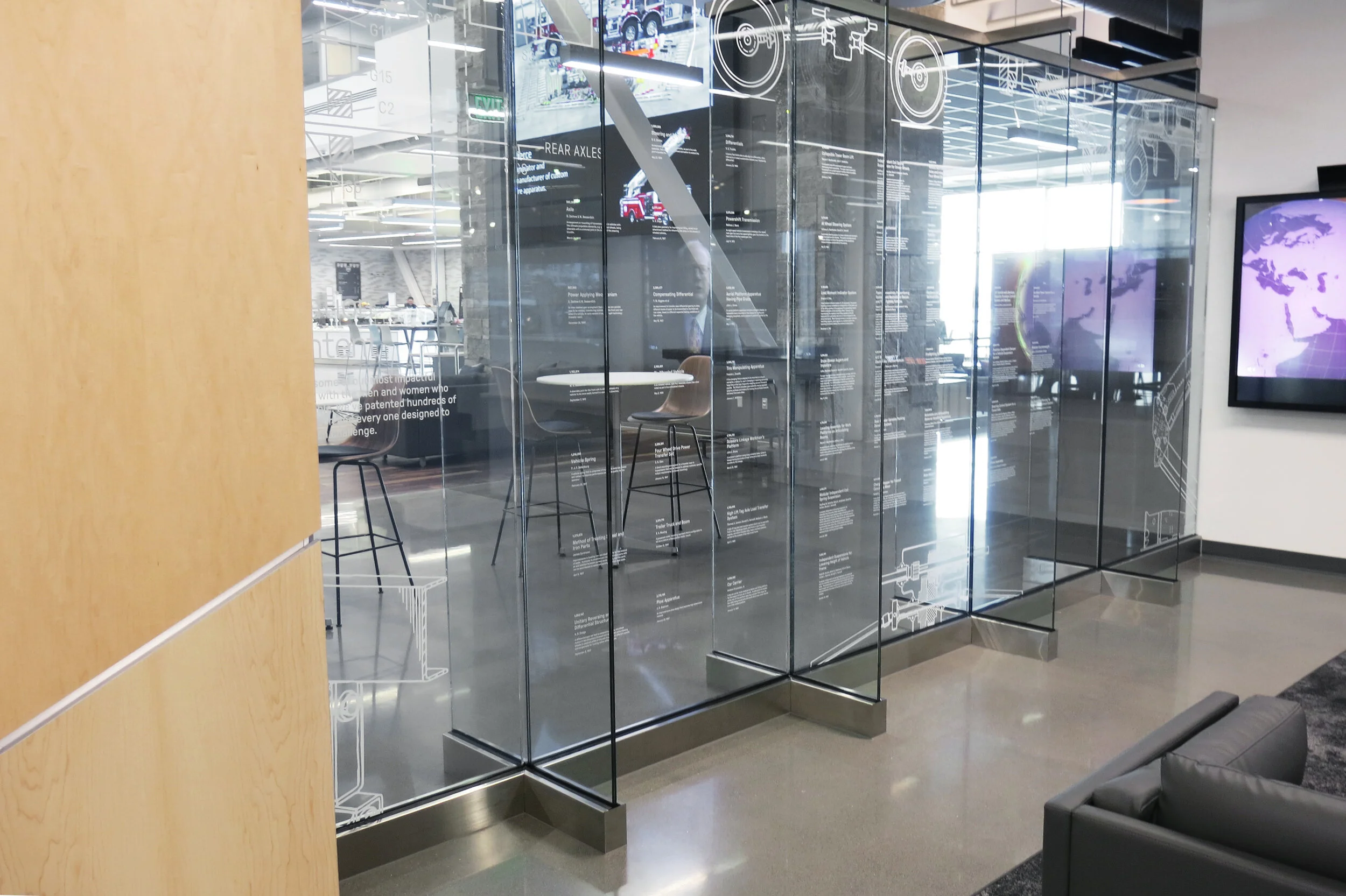 Oshkosh Headquarters → patent innovation wall