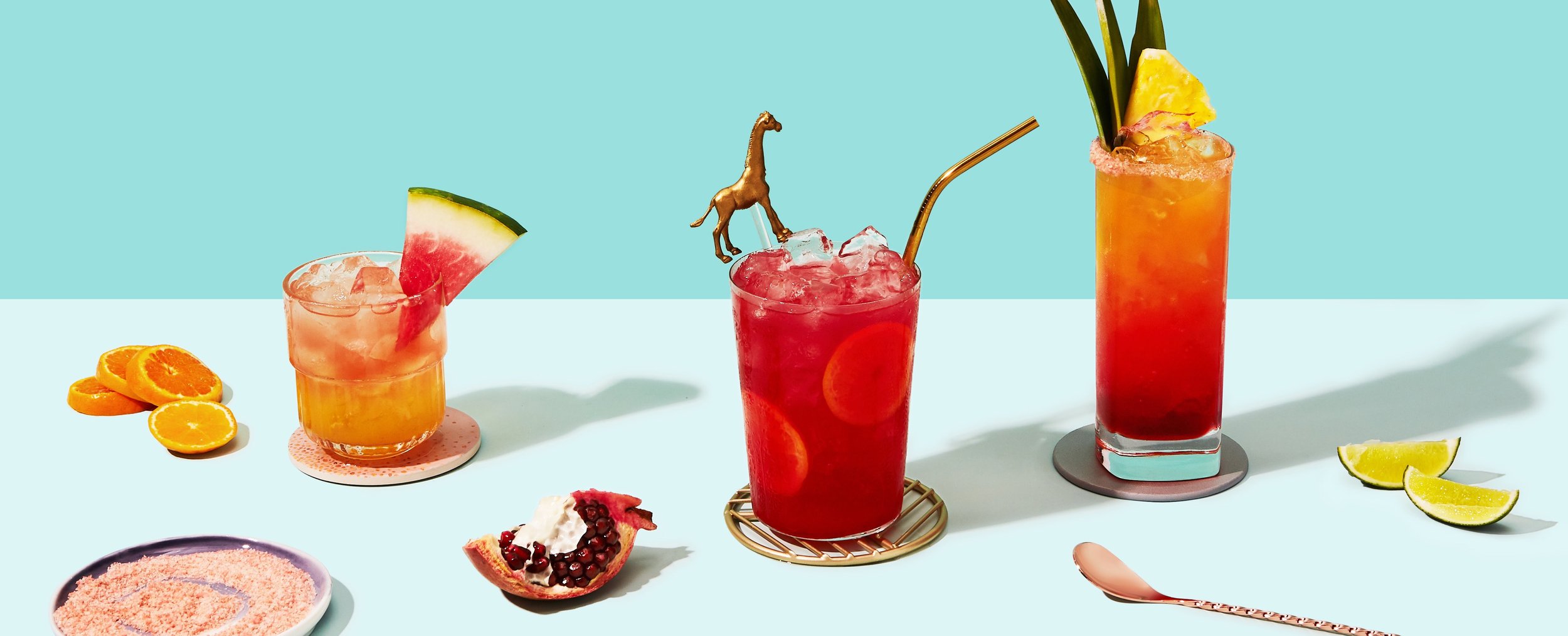 fruit forward citrus cocktails with cute cocktail pick.jpg