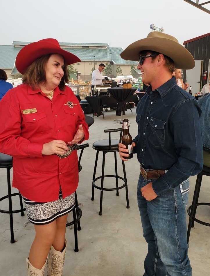 Commissioner Thomas at County Fair with a Bullrider 2020